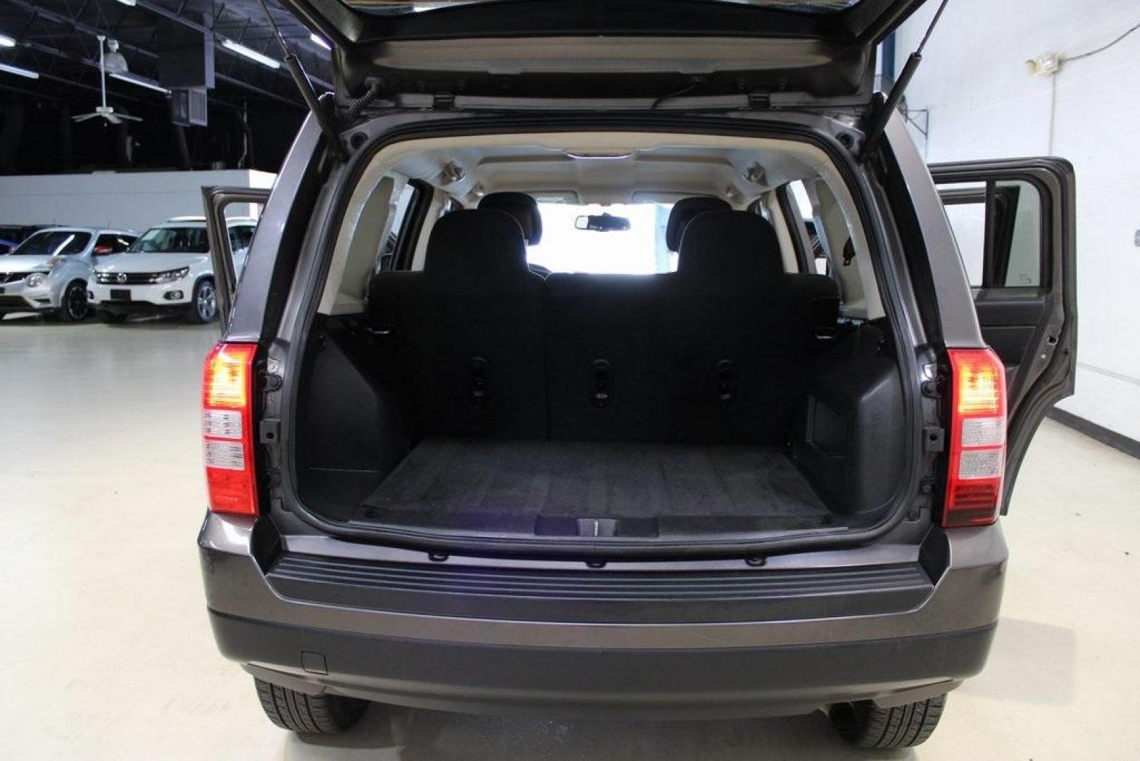 2016 Granite Crystal Metallic Clearcoat /Dark Slate Gray Jeep Patriot Latitude (1C4NJRFBXGD) with an 2.4L I4 DOHC 16V Dual VVT engine, Automatic transmission, located at 15300 Midway Rd., Addison, TX, 75001, (972) 702-0011, 32.958321, -96.838074 - Photo#20