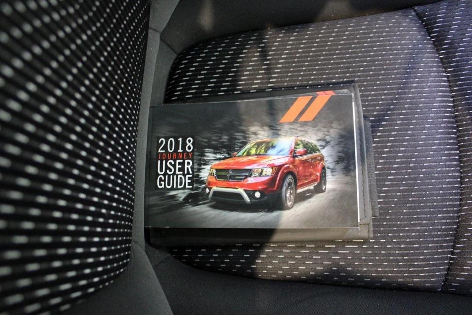2018 Vice White /Black Dodge Journey SXT (3C4PDCBBXJT) with an 2.4L I4 DOHC 16V Dual VVT engine, Automatic transmission, located at 15300 Midway Rd., Addison, TX, 75001, (972) 702-0011, 32.958321, -96.838074 - Photo#12