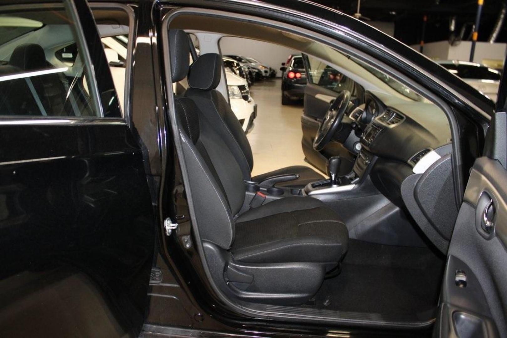 2018 Super Black /Charcoal Nissan Sentra S (3N1AB7AP0JY) with an 1.8L 4-Cylinder DOHC 16V engine, CVT transmission, located at 15300 Midway Rd., Addison, TX, 75001, (972) 702-0011, 32.958321, -96.838074 - Photo#13