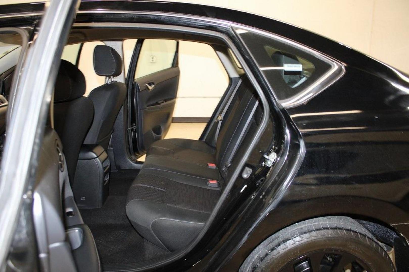 2018 Super Black /Charcoal Nissan Sentra S (3N1AB7AP0JY) with an 1.8L 4-Cylinder DOHC 16V engine, CVT transmission, located at 15300 Midway Rd., Addison, TX, 75001, (972) 702-0011, 32.958321, -96.838074 - Photo#15