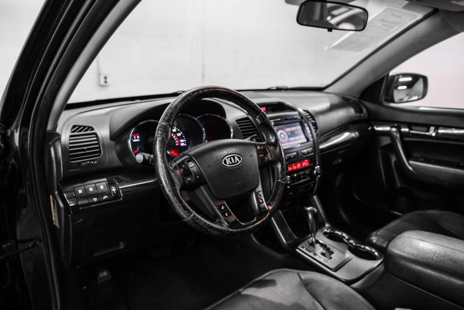 2012 Ebony Black /Black Kia Sorento EX (5XYKU4A29CG) with an 3.5L V6 DOHC Dual CVVT engine, Automatic transmission, located at 15300 Midway Rd., Addison, TX, 75001, (972) 702-0011, 32.958321, -96.838074 - Photo#2