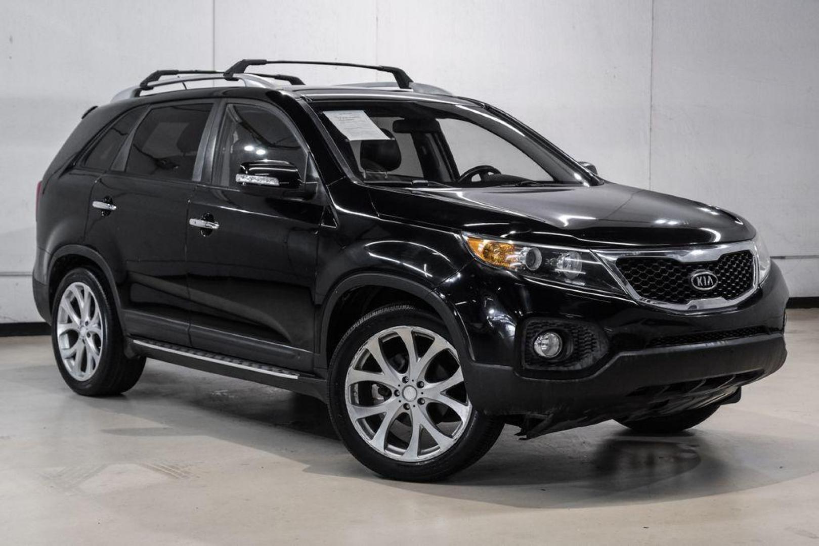 2012 Ebony Black /Black Kia Sorento EX (5XYKU4A29CG) with an 3.5L V6 DOHC Dual CVVT engine, Automatic transmission, located at 15300 Midway Rd., Addison, TX, 75001, (972) 702-0011, 32.958321, -96.838074 - Photo#6