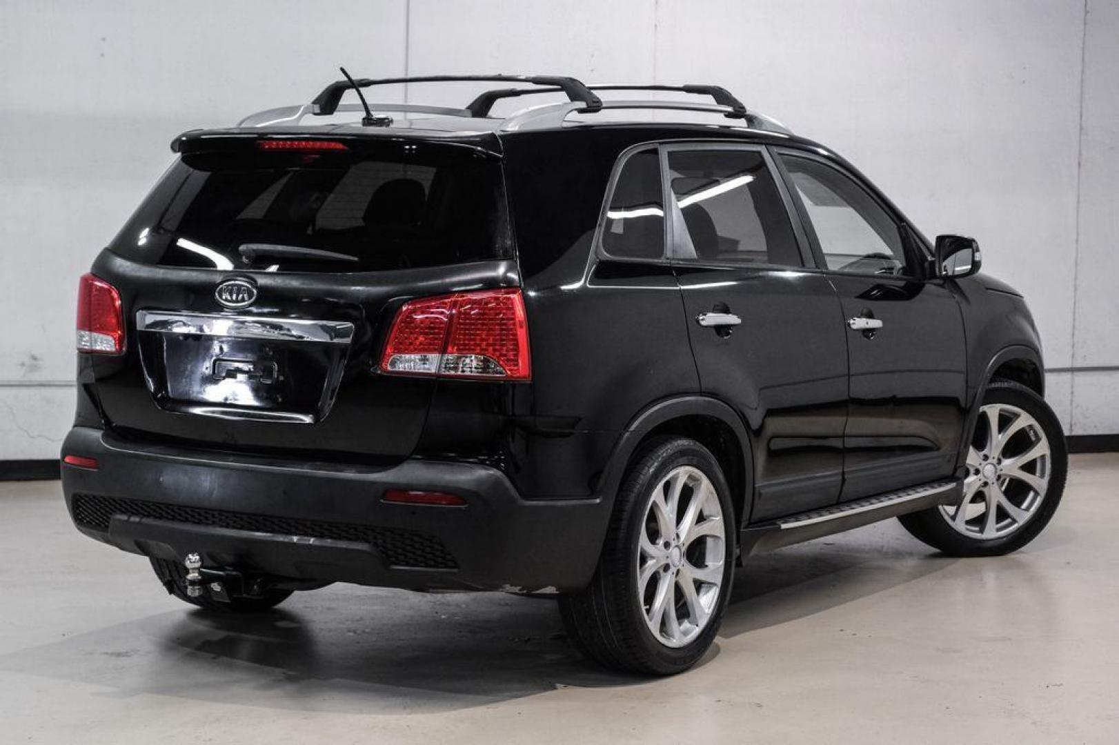 2012 Ebony Black /Black Kia Sorento EX (5XYKU4A29CG) with an 3.5L V6 DOHC Dual CVVT engine, Automatic transmission, located at 15300 Midway Rd., Addison, TX, 75001, (972) 702-0011, 32.958321, -96.838074 - Photo#8