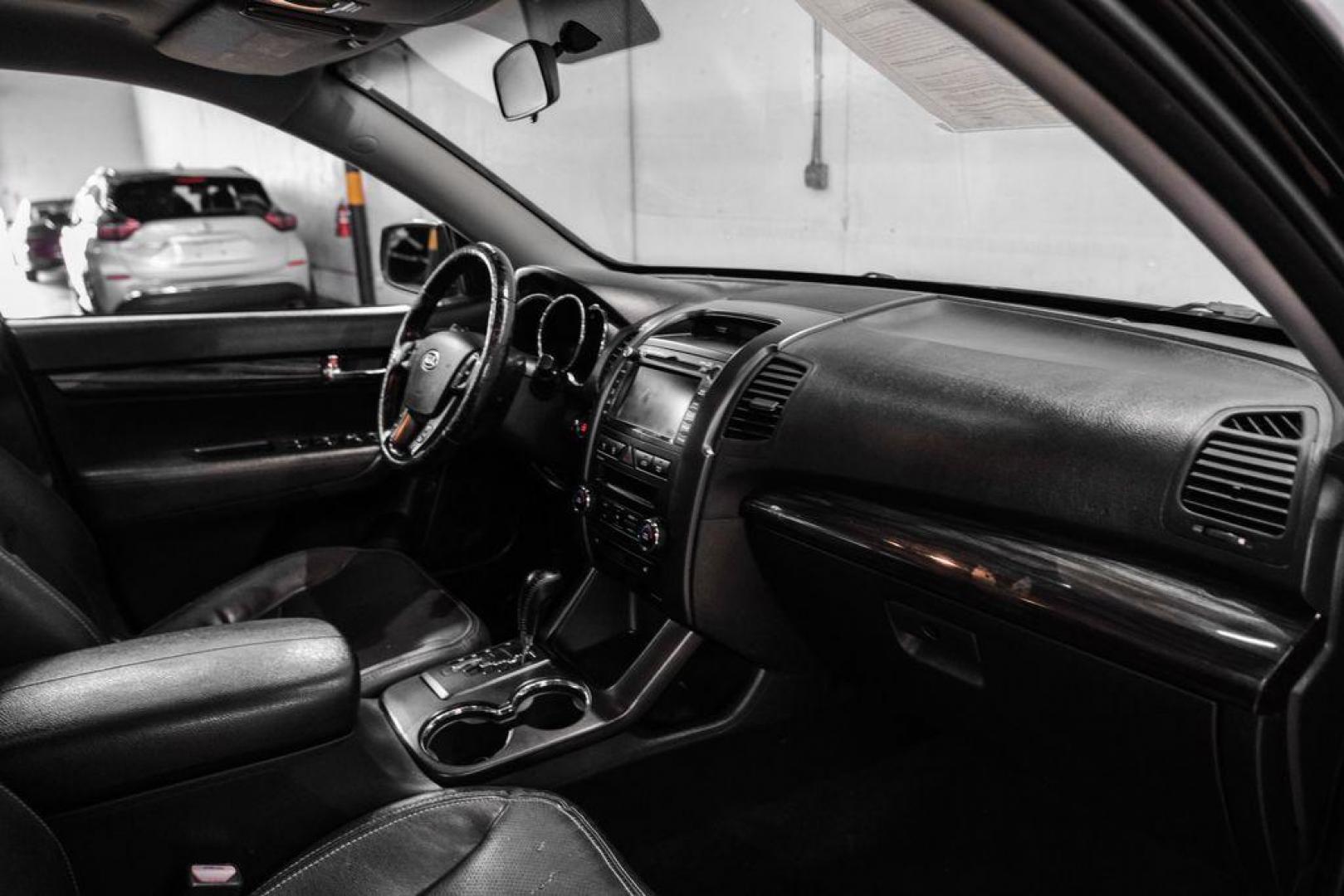 2012 Ebony Black /Black Kia Sorento EX (5XYKU4A29CG) with an 3.5L V6 DOHC Dual CVVT engine, Automatic transmission, located at 15300 Midway Rd., Addison, TX, 75001, (972) 702-0011, 32.958321, -96.838074 - Photo#12