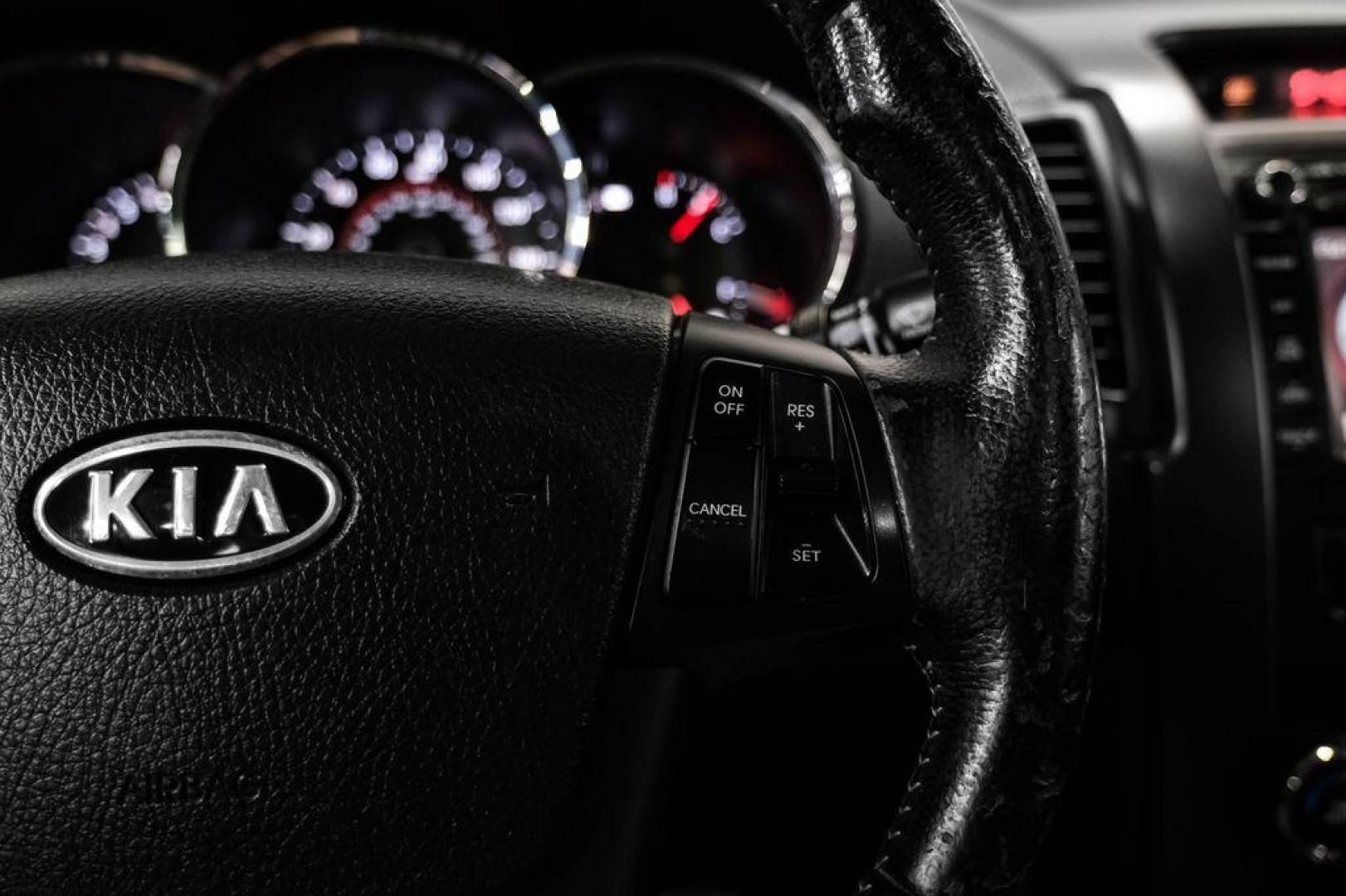 2012 Ebony Black /Black Kia Sorento EX (5XYKU4A29CG) with an 3.5L V6 DOHC Dual CVVT engine, Automatic transmission, located at 15300 Midway Rd., Addison, TX, 75001, (972) 702-0011, 32.958321, -96.838074 - Photo#17