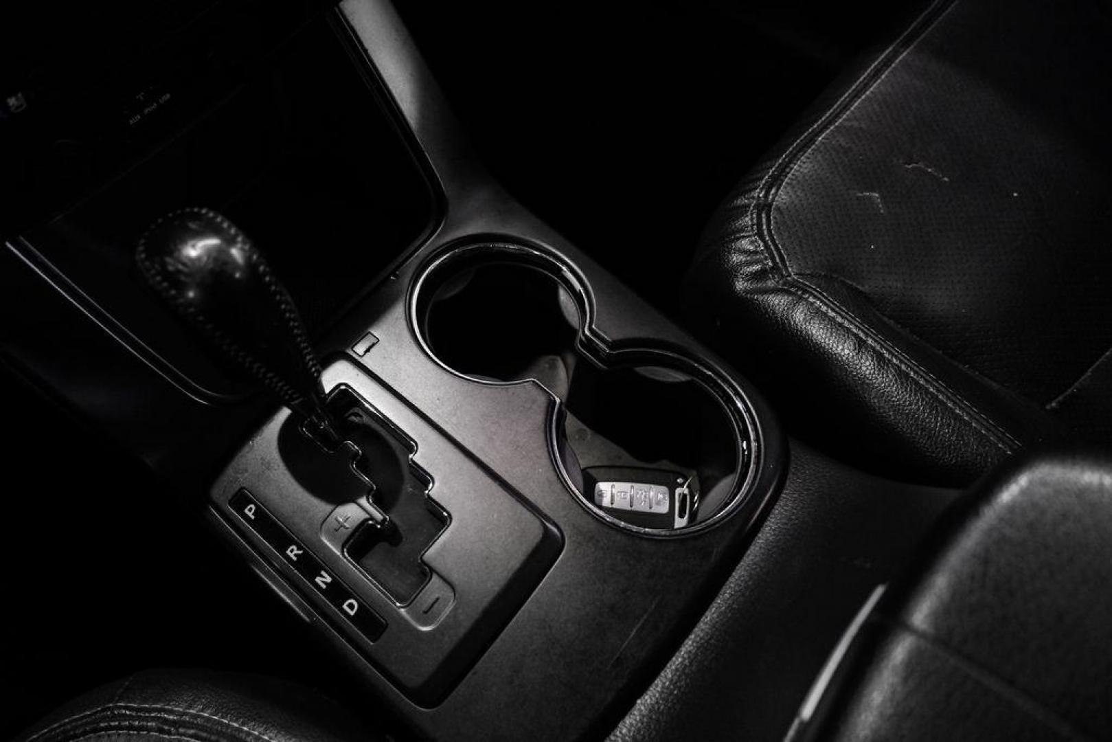 2012 Ebony Black /Black Kia Sorento EX (5XYKU4A29CG) with an 3.5L V6 DOHC Dual CVVT engine, Automatic transmission, located at 15300 Midway Rd., Addison, TX, 75001, (972) 702-0011, 32.958321, -96.838074 - Photo#24