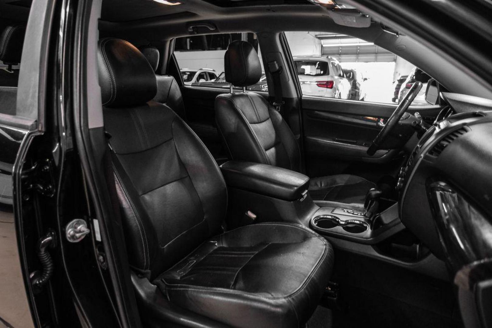 2012 Ebony Black /Black Kia Sorento EX (5XYKU4A29CG) with an 3.5L V6 DOHC Dual CVVT engine, Automatic transmission, located at 15300 Midway Rd., Addison, TX, 75001, (972) 702-0011, 32.958321, -96.838074 - Photo#31