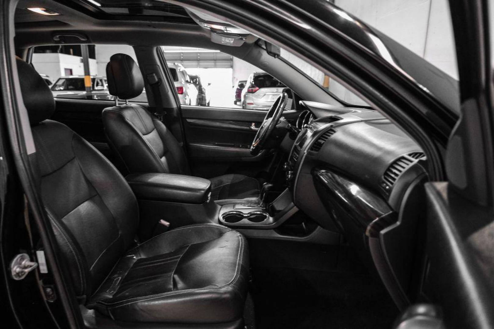 2012 Ebony Black /Black Kia Sorento EX (5XYKU4A29CG) with an 3.5L V6 DOHC Dual CVVT engine, Automatic transmission, located at 15300 Midway Rd., Addison, TX, 75001, (972) 702-0011, 32.958321, -96.838074 - Photo#32