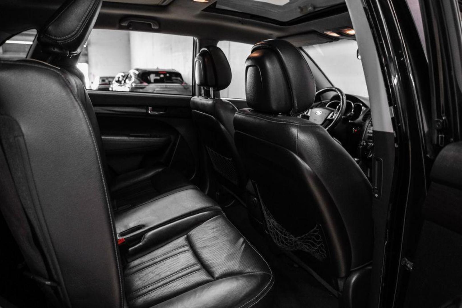 2012 Ebony Black /Black Kia Sorento EX (5XYKU4A29CG) with an 3.5L V6 DOHC Dual CVVT engine, Automatic transmission, located at 15300 Midway Rd., Addison, TX, 75001, (972) 702-0011, 32.958321, -96.838074 - Photo#34