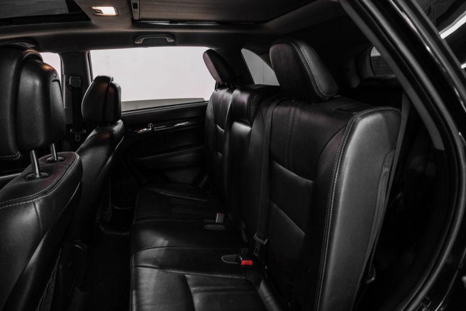 2012 Ebony Black /Black Kia Sorento EX (5XYKU4A29CG) with an 3.5L V6 DOHC Dual CVVT engine, Automatic transmission, located at 15300 Midway Rd., Addison, TX, 75001, (972) 702-0011, 32.958321, -96.838074 - Photo#36