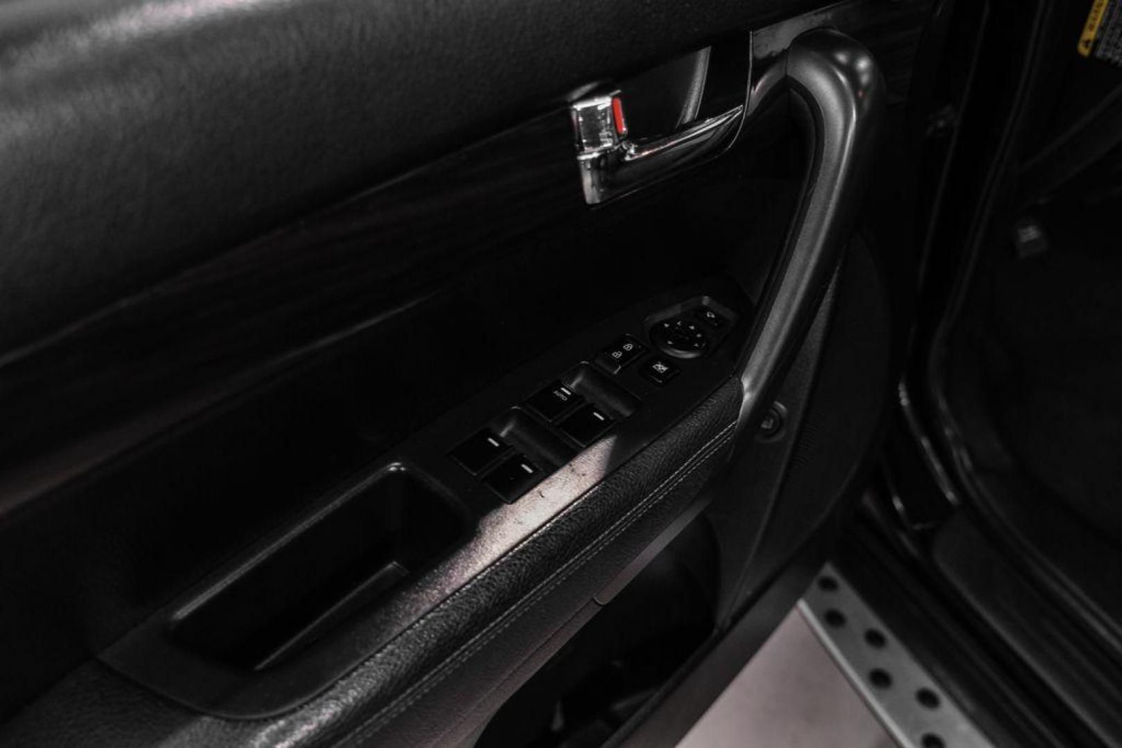 2012 Ebony Black /Black Kia Sorento EX (5XYKU4A29CG) with an 3.5L V6 DOHC Dual CVVT engine, Automatic transmission, located at 15300 Midway Rd., Addison, TX, 75001, (972) 702-0011, 32.958321, -96.838074 - Photo#40