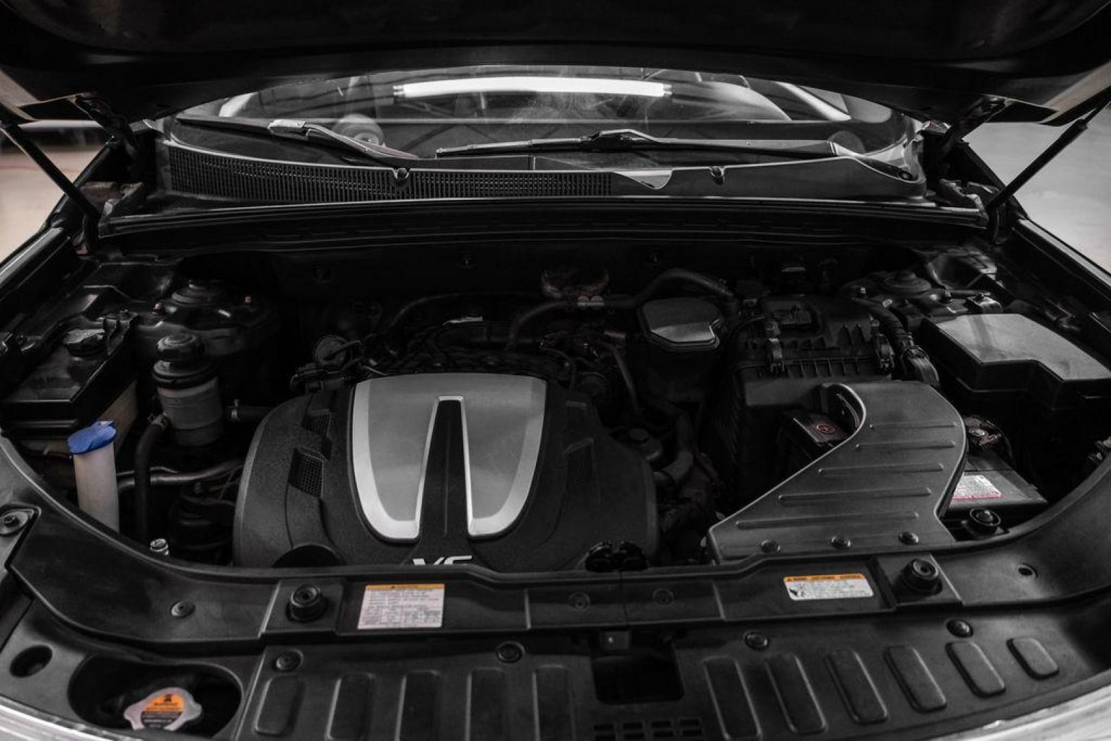 2012 Ebony Black /Black Kia Sorento EX (5XYKU4A29CG) with an 3.5L V6 DOHC Dual CVVT engine, Automatic transmission, located at 15300 Midway Rd., Addison, TX, 75001, (972) 702-0011, 32.958321, -96.838074 - Photo#47