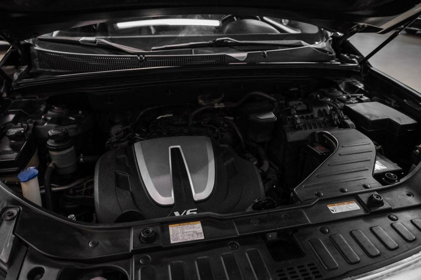 2012 Ebony Black /Black Kia Sorento EX (5XYKU4A29CG) with an 3.5L V6 DOHC Dual CVVT engine, Automatic transmission, located at 15300 Midway Rd., Addison, TX, 75001, (972) 702-0011, 32.958321, -96.838074 - Photo#48