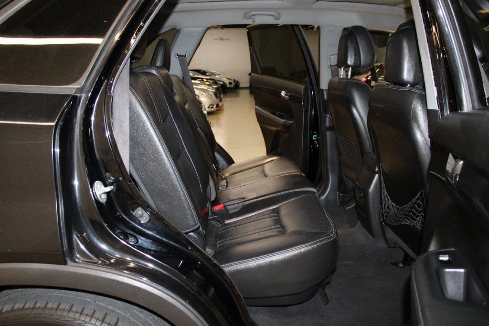 2012 Ebony Black /Black Kia Sorento EX (5XYKU4A29CG) with an 3.5L V6 DOHC Dual CVVT engine, Automatic transmission, located at 15300 Midway Rd., Addison, TX, 75001, (972) 702-0011, 32.958321, -96.838074 - Introducing the 2012 Kia Sorento EX, now available at Midway Auto Group in Addison, Texas. This midsize SUV offers a compelling blend of performance, comfort, and advanced features, making it an excellent choice for families and individuals seeking versatility and reliability.<br><br>Key Features:<b - Photo#15