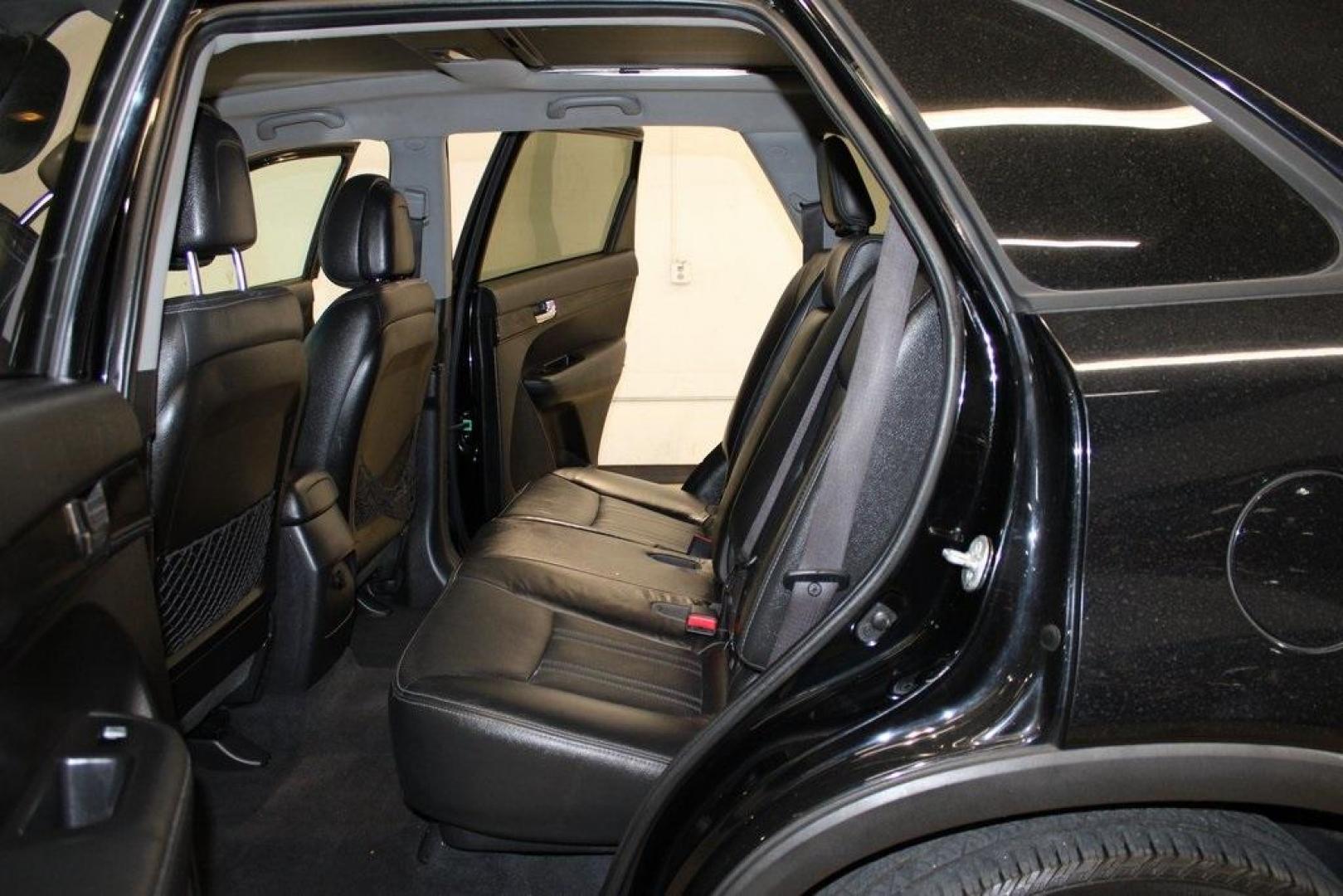 2012 Ebony Black /Black Kia Sorento EX (5XYKU4A29CG) with an 3.5L V6 DOHC Dual CVVT engine, Automatic transmission, located at 15300 Midway Rd., Addison, TX, 75001, (972) 702-0011, 32.958321, -96.838074 - Introducing the 2012 Kia Sorento EX, now available at Midway Auto Group in Addison, Texas. This midsize SUV offers a compelling blend of performance, comfort, and advanced features, making it an excellent choice for families and individuals seeking versatility and reliability.<br><br>Key Features:<b - Photo#16