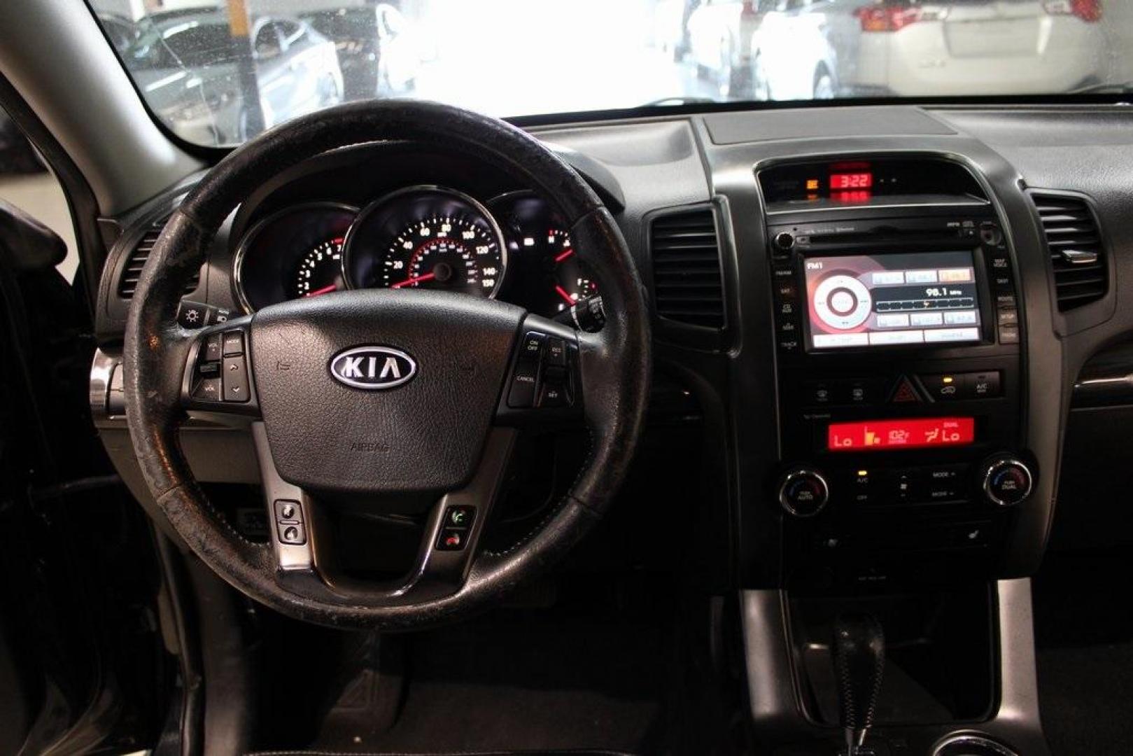 2012 Ebony Black /Black Kia Sorento EX (5XYKU4A29CG) with an 3.5L V6 DOHC Dual CVVT engine, Automatic transmission, located at 15300 Midway Rd., Addison, TX, 75001, (972) 702-0011, 32.958321, -96.838074 - Introducing the 2012 Kia Sorento EX, now available at Midway Auto Group in Addison, Texas. This midsize SUV offers a compelling blend of performance, comfort, and advanced features, making it an excellent choice for families and individuals seeking versatility and reliability.<br><br>Key Features:<b - Photo#18