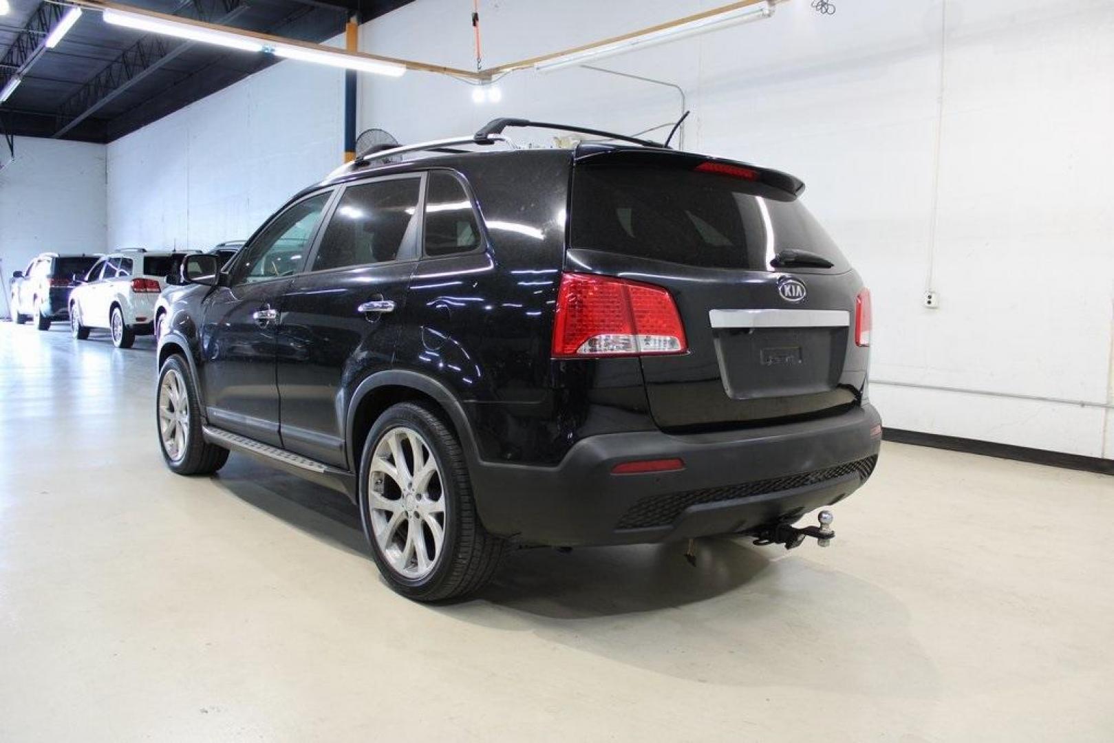 2012 Ebony Black /Black Kia Sorento EX (5XYKU4A29CG) with an 3.5L V6 DOHC Dual CVVT engine, Automatic transmission, located at 15300 Midway Rd., Addison, TX, 75001, (972) 702-0011, 32.958321, -96.838074 - Introducing the 2012 Kia Sorento EX, now available at Midway Auto Group in Addison, Texas. This midsize SUV offers a compelling blend of performance, comfort, and advanced features, making it an excellent choice for families and individuals seeking versatility and reliability.<br><br>Key Features:<b - Photo#3