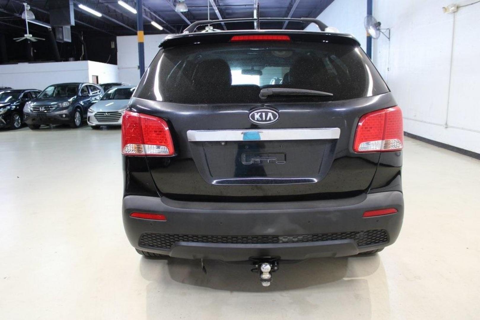 2012 Ebony Black /Black Kia Sorento EX (5XYKU4A29CG) with an 3.5L V6 DOHC Dual CVVT engine, Automatic transmission, located at 15300 Midway Rd., Addison, TX, 75001, (972) 702-0011, 32.958321, -96.838074 - Introducing the 2012 Kia Sorento EX, now available at Midway Auto Group in Addison, Texas. This midsize SUV offers a compelling blend of performance, comfort, and advanced features, making it an excellent choice for families and individuals seeking versatility and reliability.<br><br>Key Features:<b - Photo#7