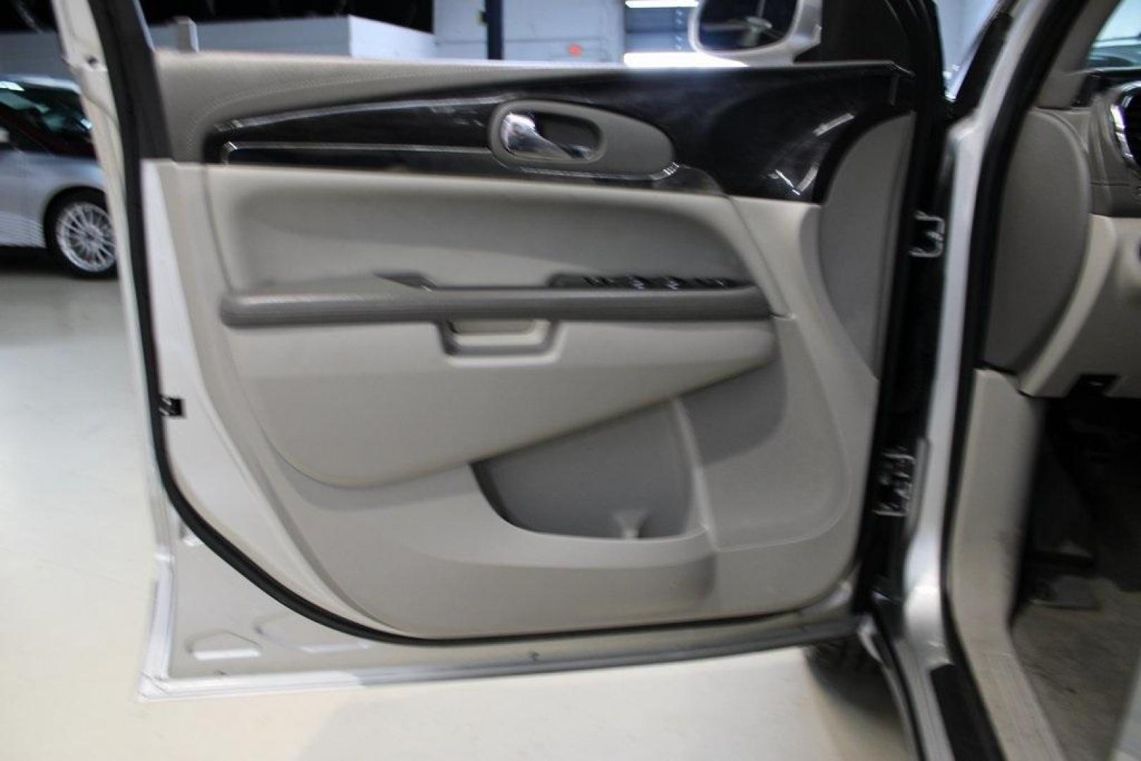 2016 Quicksilver Metallic /Light Titanium Buick Enclave Convenience Group (5GAKRAKD2GJ) with an 3.6L V6 SIDI VVT engine, Automatic transmission, located at 15300 Midway Rd., Addison, TX, 75001, (972) 702-0011, 32.958321, -96.838074 - Introducing the 2016 Buick Enclave Convenience Group, now available at Midway Auto Group in Addison, Texas. This midsize luxury SUV offers a spacious interior, smooth performance, and a suite of modern features, making it an excellent choice for families and individuals seeking comfort and versatili - Photo#26