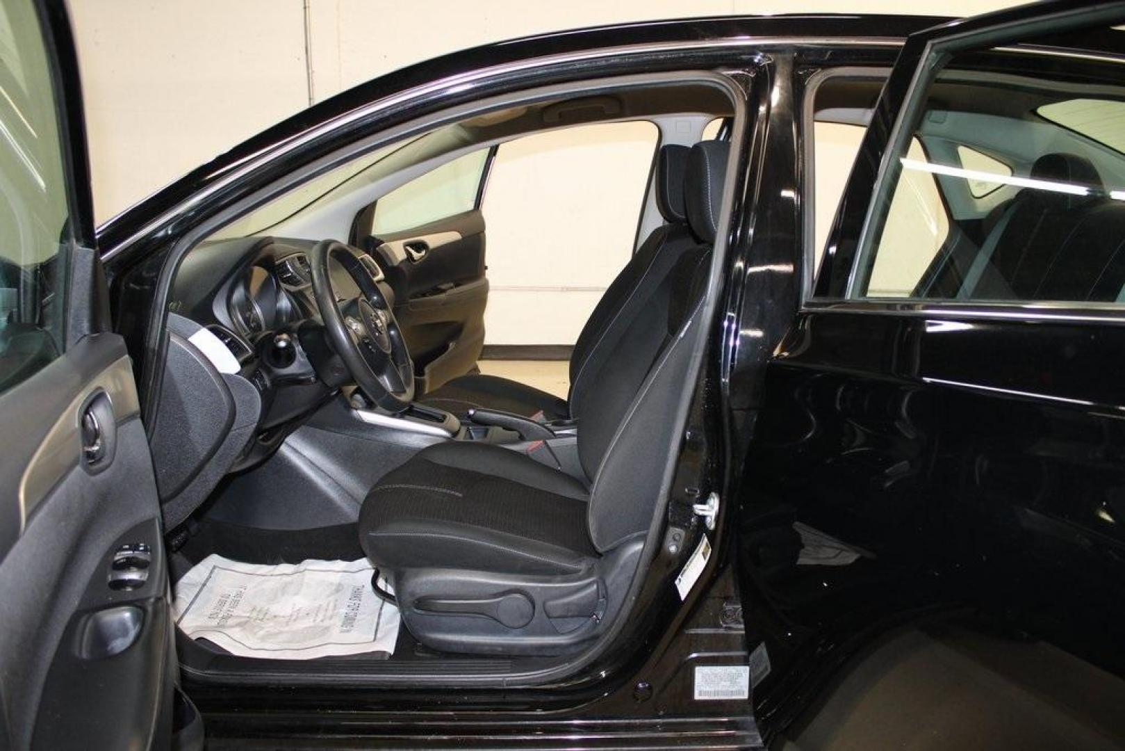 2018 Super Black /Charcoal Nissan Sentra S (3N1AB7AP6JY) with an 1.8L 4-Cylinder DOHC 16V engine, CVT transmission, located at 15300 Midway Rd., Addison, TX, 75001, (972) 702-0011, 32.958321, -96.838074 - Photo#12