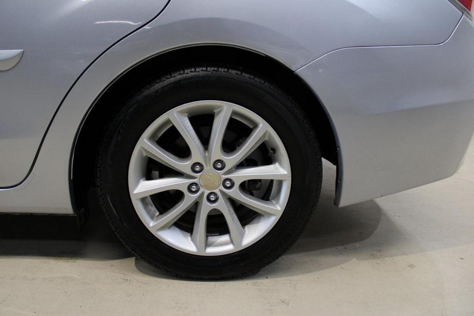 2013 Ice Silver Metallic /Black Subaru Impreza 2.0i Premium (JF1GJAB61DH) with an 2.0L 4-Cylinder SMPI DOHC 16V engine, CVT transmission, located at 15300 Midway Rd., Addison, TX, 75001, (972) 702-0011, 32.958321, -96.838074 - Introducing the 2013 Subaru Impreza 2.0i, now available at Midway Auto Group in Addison, Texas. This compact sedan seamlessly combines efficiency, versatility, and Subaru's renowned all-wheel-drive capability, making it an excellent choice for both city commutes and weekend adventures.<br><br>Key Fe - Photo#9