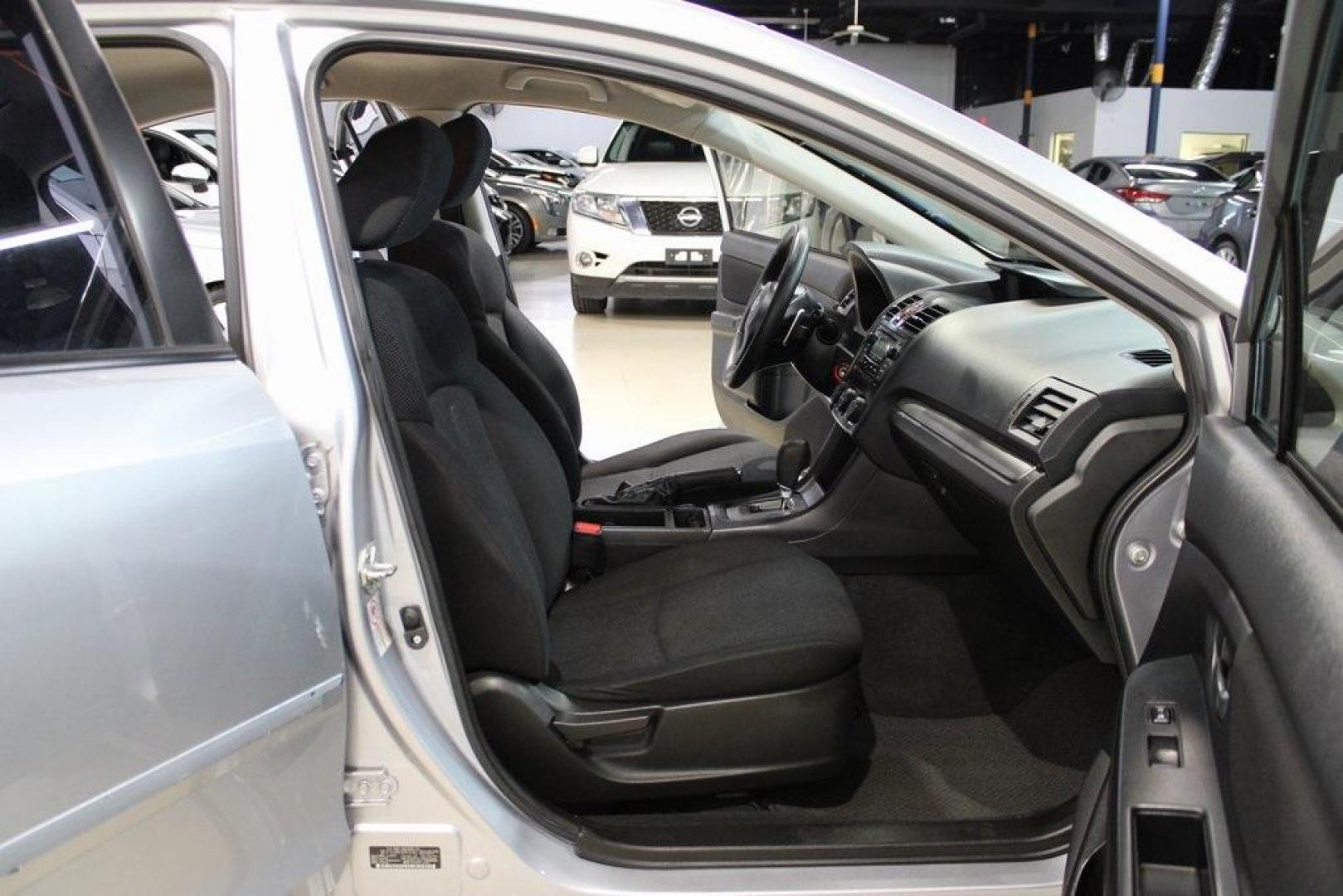2013 Ice Silver Metallic /Black Subaru Impreza 2.0i Premium (JF1GJAB61DH) with an 2.0L 4-Cylinder SMPI DOHC 16V engine, CVT transmission, located at 15300 Midway Rd., Addison, TX, 75001, (972) 702-0011, 32.958321, -96.838074 - Introducing the 2013 Subaru Impreza 2.0i, now available at Midway Auto Group in Addison, Texas. This compact sedan seamlessly combines efficiency, versatility, and Subaru's renowned all-wheel-drive capability, making it an excellent choice for both city commutes and weekend adventures.<br><br>Key Fe - Photo#13