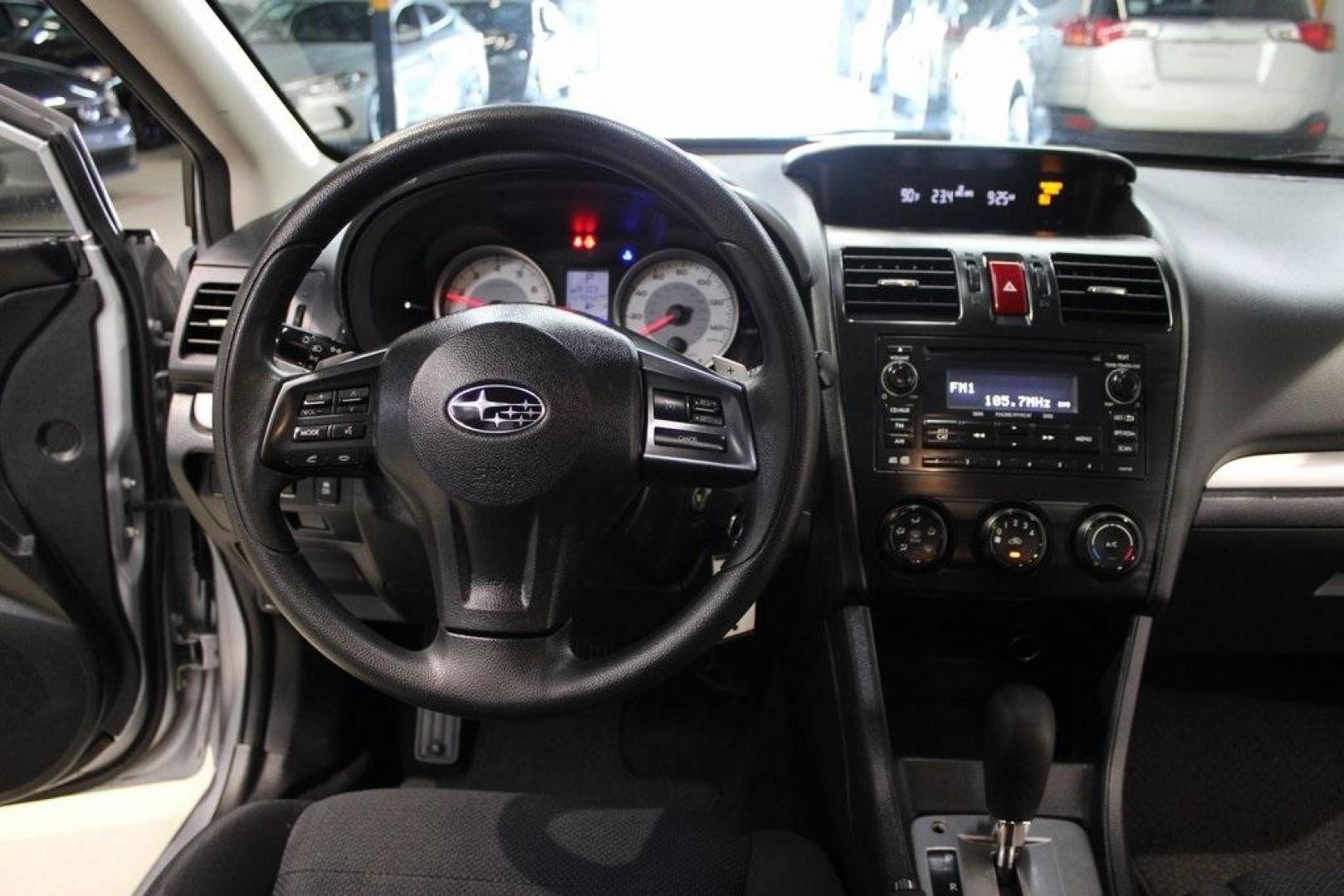 2013 Ice Silver Metallic /Black Subaru Impreza 2.0i Premium (JF1GJAB61DH) with an 2.0L 4-Cylinder SMPI DOHC 16V engine, CVT transmission, located at 15300 Midway Rd., Addison, TX, 75001, (972) 702-0011, 32.958321, -96.838074 - Introducing the 2013 Subaru Impreza 2.0i, now available at Midway Auto Group in Addison, Texas. This compact sedan seamlessly combines efficiency, versatility, and Subaru's renowned all-wheel-drive capability, making it an excellent choice for both city commutes and weekend adventures.<br><br>Key Fe - Photo#16