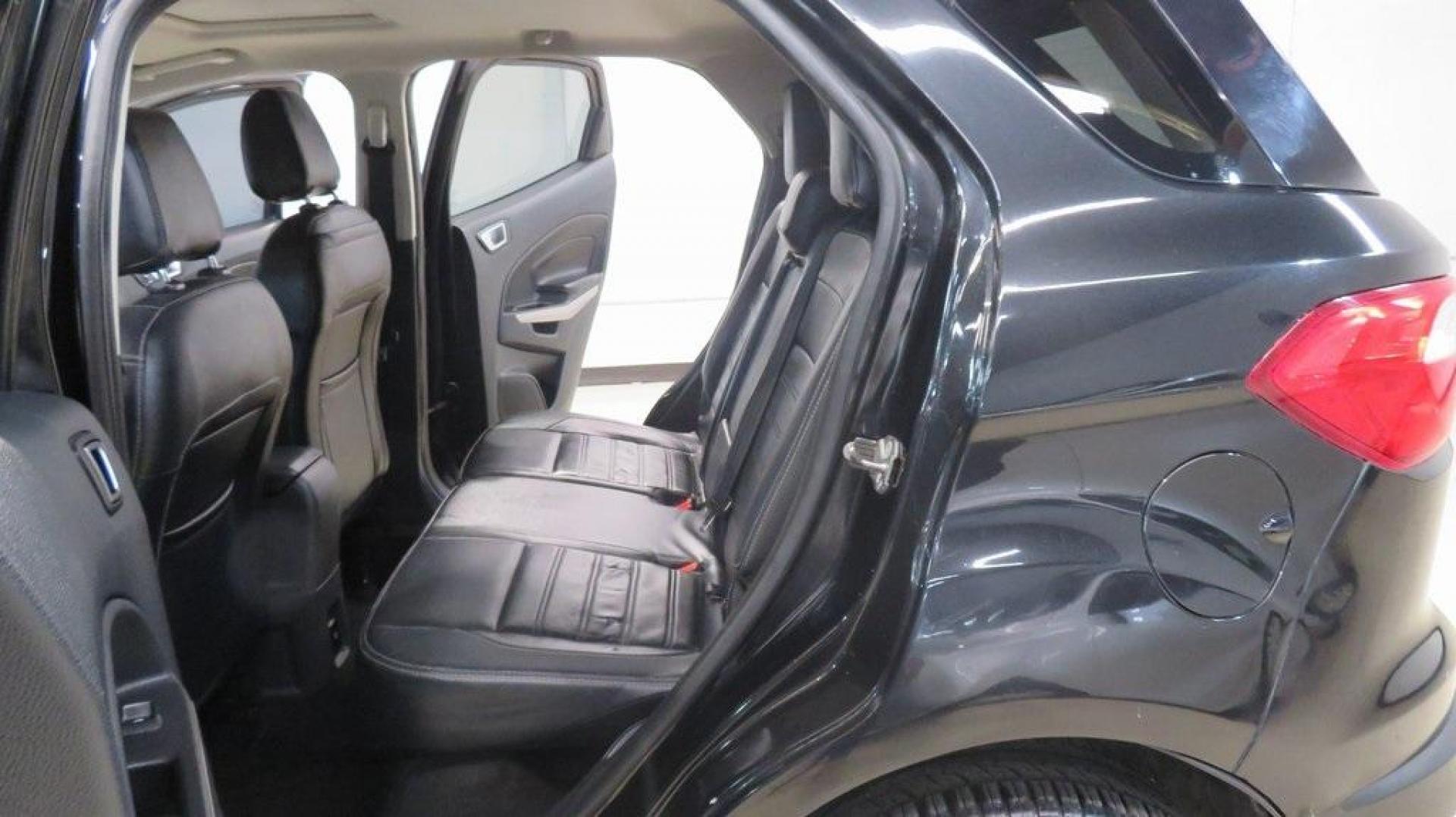 2018 Shadow Black /Black Ford EcoSport Titanium (MAJ3P1VE7JC) with an EcoBoost 1.0L I3 GTDi DOHC Turbocharged VCT engine, Automatic transmission, located at 15300 Midway Rd., Addison, TX, 75001, (972) 702-0011, 32.958321, -96.838074 - Photo#16