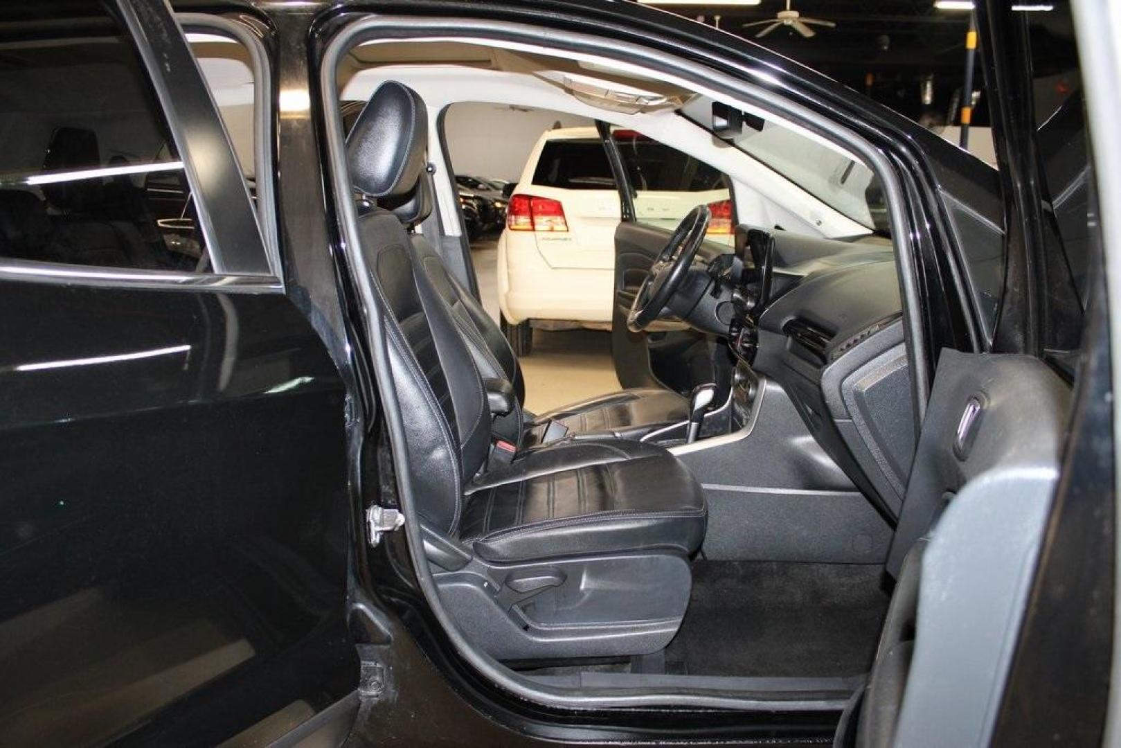 2018 Shadow Black /Black Ford EcoSport Titanium (MAJ3P1VE7JC) with an EcoBoost 1.0L I3 GTDi DOHC Turbocharged VCT engine, Automatic transmission, located at 15300 Midway Rd., Addison, TX, 75001, (972) 702-0011, 32.958321, -96.838074 - Introducing the 2018 Ford EcoSport SE, now available at Midway Auto Group in Addison, Texas. This compact SUV seamlessly blends efficiency, versatility, and modern features, making it an excellent choice for urban commutes and weekend adventures alike.<br><br>Key Features:<br><br>Engine: 1.0L EcoBoo - Photo#14