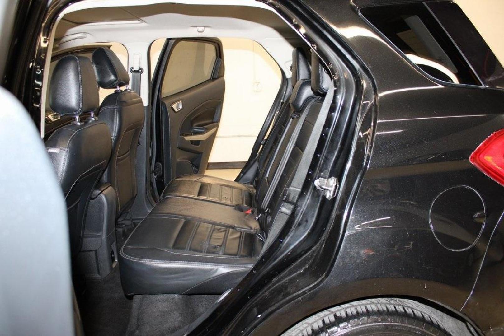 2018 Shadow Black /Black Ford EcoSport Titanium (MAJ3P1VE7JC) with an EcoBoost 1.0L I3 GTDi DOHC Turbocharged VCT engine, Automatic transmission, located at 15300 Midway Rd., Addison, TX, 75001, (972) 702-0011, 32.958321, -96.838074 - Introducing the 2018 Ford EcoSport SE, now available at Midway Auto Group in Addison, Texas. This compact SUV seamlessly blends efficiency, versatility, and modern features, making it an excellent choice for urban commutes and weekend adventures alike.<br><br>Key Features:<br><br>Engine: 1.0L EcoBoo - Photo#16