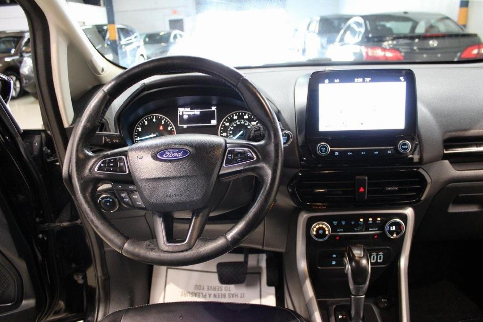 2018 Shadow Black /Black Ford EcoSport Titanium (MAJ3P1VE7JC) with an EcoBoost 1.0L I3 GTDi DOHC Turbocharged VCT engine, Automatic transmission, located at 15300 Midway Rd., Addison, TX, 75001, (972) 702-0011, 32.958321, -96.838074 - Introducing the 2018 Ford EcoSport SE, now available at Midway Auto Group in Addison, Texas. This compact SUV seamlessly blends efficiency, versatility, and modern features, making it an excellent choice for urban commutes and weekend adventures alike.<br><br>Key Features:<br><br>Engine: 1.0L EcoBoo - Photo#17