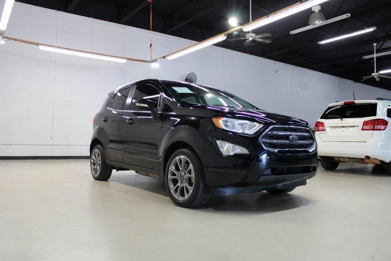 2018 Shadow Black /Black Ford EcoSport Titanium (MAJ3P1VE7JC) with an EcoBoost 1.0L I3 GTDi DOHC Turbocharged VCT engine, Automatic transmission, located at 15300 Midway Rd., Addison, TX, 75001, (972) 702-0011, 32.958321, -96.838074 - Introducing the 2018 Ford EcoSport SE, now available at Midway Auto Group in Addison, Texas. This compact SUV seamlessly blends efficiency, versatility, and modern features, making it an excellent choice for urban commutes and weekend adventures alike.<br><br>Key Features:<br><br>Engine: 1.0L EcoBoo - Photo#1