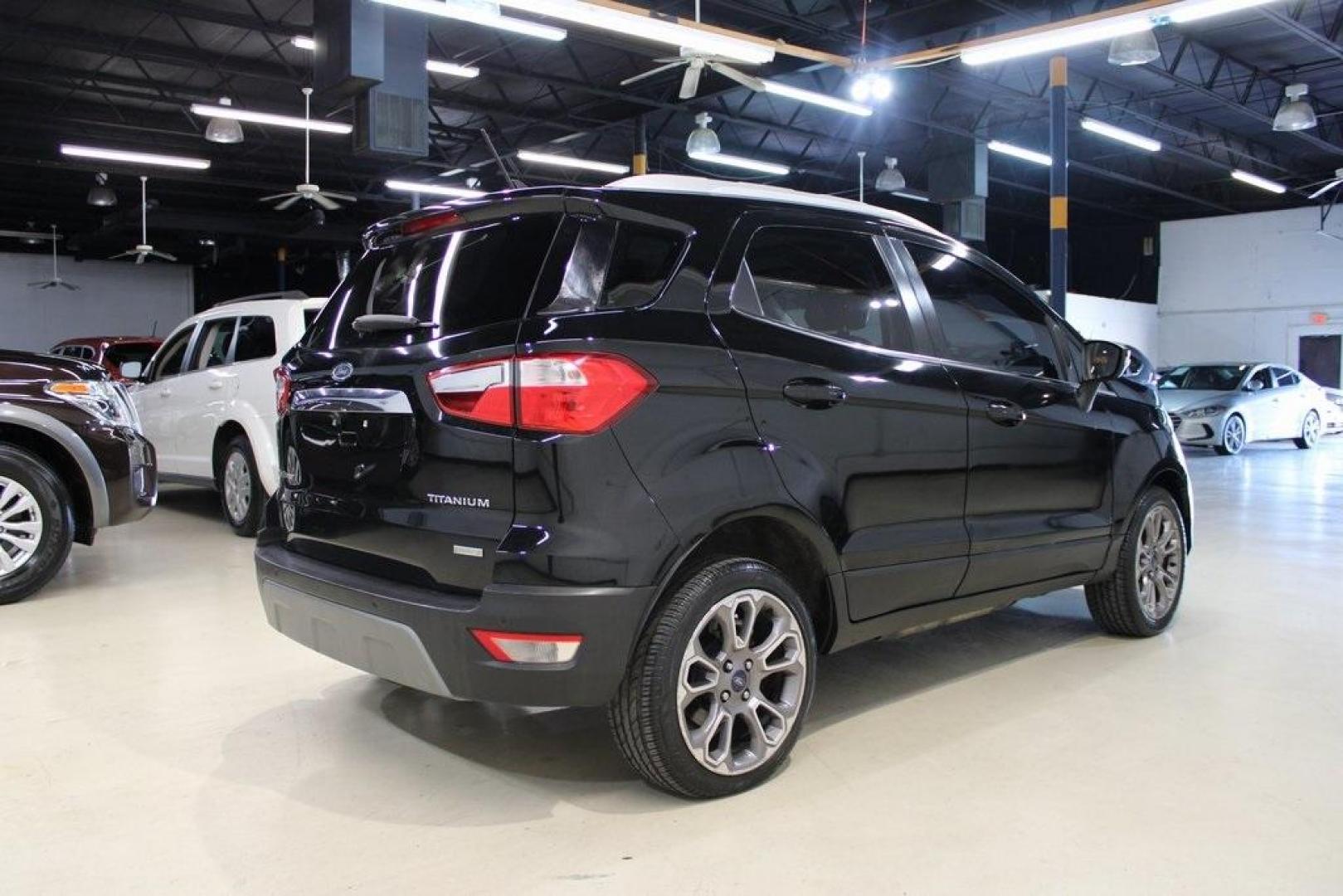 2018 Shadow Black /Black Ford EcoSport Titanium (MAJ3P1VE7JC) with an EcoBoost 1.0L I3 GTDi DOHC Turbocharged VCT engine, Automatic transmission, located at 15300 Midway Rd., Addison, TX, 75001, (972) 702-0011, 32.958321, -96.838074 - Introducing the 2018 Ford EcoSport SE, now available at Midway Auto Group in Addison, Texas. This compact SUV seamlessly blends efficiency, versatility, and modern features, making it an excellent choice for urban commutes and weekend adventures alike.<br><br>Key Features:<br><br>Engine: 1.0L EcoBoo - Photo#2