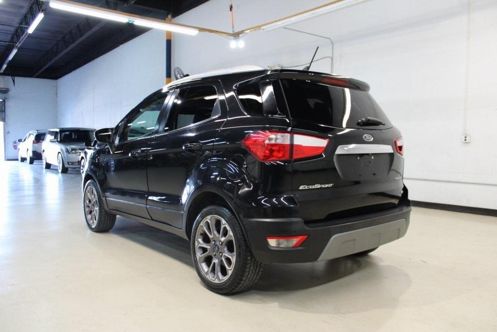 2018 Shadow Black /Black Ford EcoSport Titanium (MAJ3P1VE7JC) with an EcoBoost 1.0L I3 GTDi DOHC Turbocharged VCT engine, Automatic transmission, located at 15300 Midway Rd., Addison, TX, 75001, (972) 702-0011, 32.958321, -96.838074 - Introducing the 2018 Ford EcoSport SE, now available at Midway Auto Group in Addison, Texas. This compact SUV seamlessly blends efficiency, versatility, and modern features, making it an excellent choice for urban commutes and weekend adventures alike.<br><br>Key Features:<br><br>Engine: 1.0L EcoBoo - Photo#3