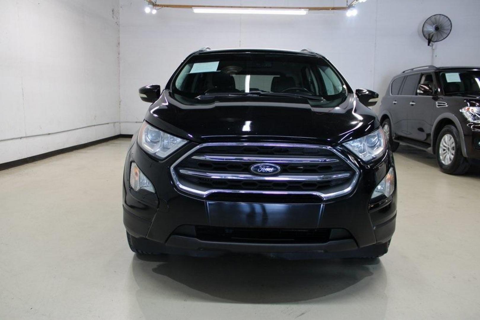 2018 Shadow Black /Black Ford EcoSport Titanium (MAJ3P1VE7JC) with an EcoBoost 1.0L I3 GTDi DOHC Turbocharged VCT engine, Automatic transmission, located at 15300 Midway Rd., Addison, TX, 75001, (972) 702-0011, 32.958321, -96.838074 - Introducing the 2018 Ford EcoSport SE, now available at Midway Auto Group in Addison, Texas. This compact SUV seamlessly blends efficiency, versatility, and modern features, making it an excellent choice for urban commutes and weekend adventures alike.<br><br>Key Features:<br><br>Engine: 1.0L EcoBoo - Photo#5