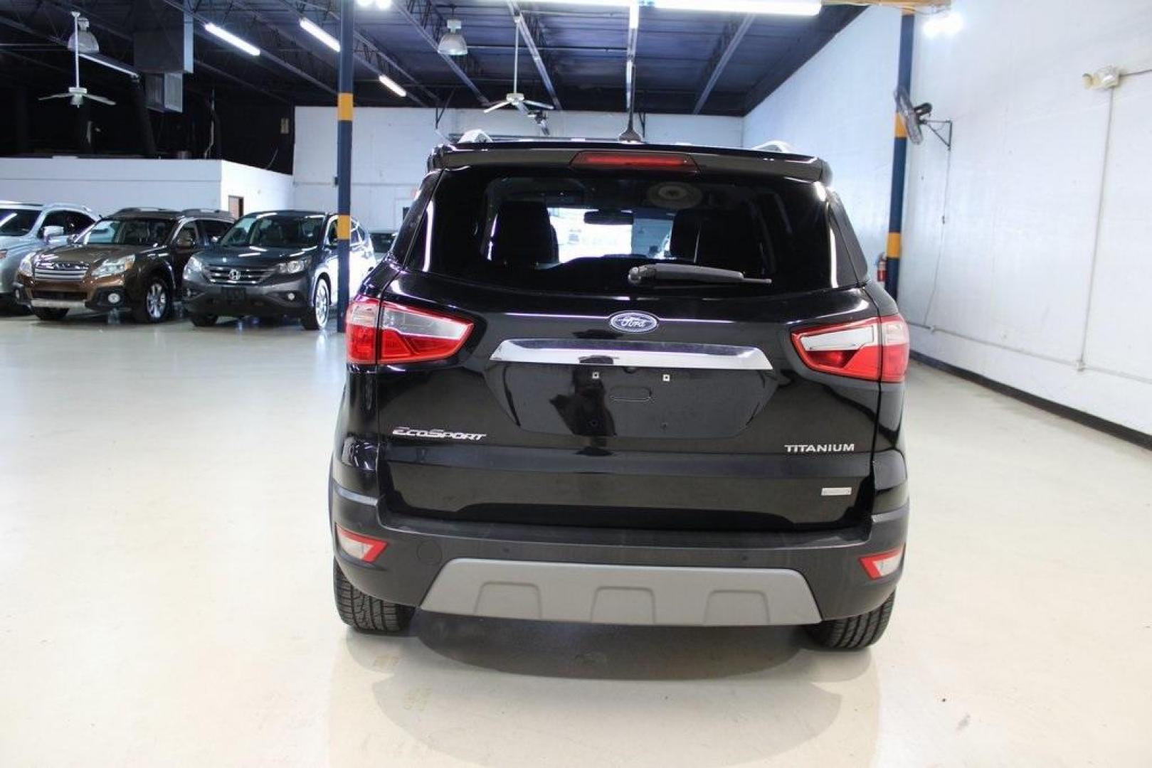 2018 Shadow Black /Black Ford EcoSport Titanium (MAJ3P1VE7JC) with an EcoBoost 1.0L I3 GTDi DOHC Turbocharged VCT engine, Automatic transmission, located at 15300 Midway Rd., Addison, TX, 75001, (972) 702-0011, 32.958321, -96.838074 - Introducing the 2018 Ford EcoSport SE, now available at Midway Auto Group in Addison, Texas. This compact SUV seamlessly blends efficiency, versatility, and modern features, making it an excellent choice for urban commutes and weekend adventures alike.<br><br>Key Features:<br><br>Engine: 1.0L EcoBoo - Photo#7