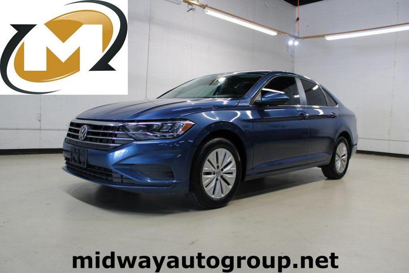 2020 Silk /Black Volkswagen Jetta 1.4T S (3VWCB7BU6LM) with an 1.4L TSI engine, Automatic transmission, located at 15300 Midway Rd., Addison, TX, 75001, (972) 702-0011, 32.958321, -96.838074 - HOME OF THE NO HAGGLE PRICE - WHOLESALE PRICES TO THE PUBLIC!! Priced below KBB Fair Purchase Price!<br><br>Blue Silk Metallic 2020 Volkswagen Jetta 1.4T S<br><br>30/40 City/Highway MPG<br><br>Awards:<br> * 2020 KBB.com 10 Coolest New Cars Under $20,000<br><br>At Midway Auto Group, we strive to pro - Photo#0