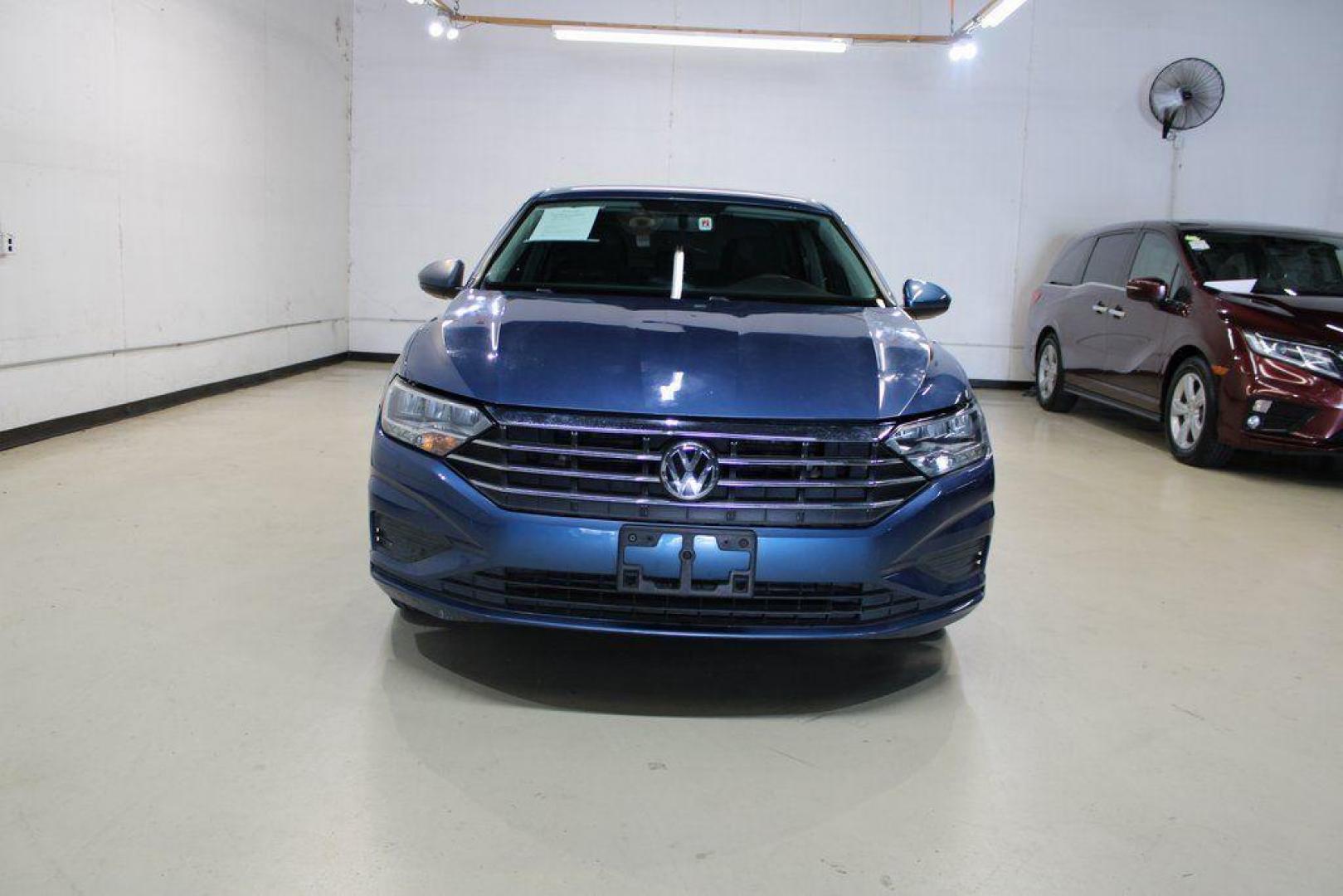 2020 Silk /Black Volkswagen Jetta 1.4T S (3VWCB7BU6LM) with an 1.4L TSI engine, Automatic transmission, located at 15300 Midway Rd., Addison, TX, 75001, (972) 702-0011, 32.958321, -96.838074 - HOME OF THE NO HAGGLE PRICE - WHOLESALE PRICES TO THE PUBLIC!! Priced below KBB Fair Purchase Price!<br><br>Blue Silk Metallic 2020 Volkswagen Jetta 1.4T S<br><br>30/40 City/Highway MPG<br><br>Awards:<br> * 2020 KBB.com 10 Coolest New Cars Under $20,000<br><br>At Midway Auto Group, we strive to pro - Photo#5