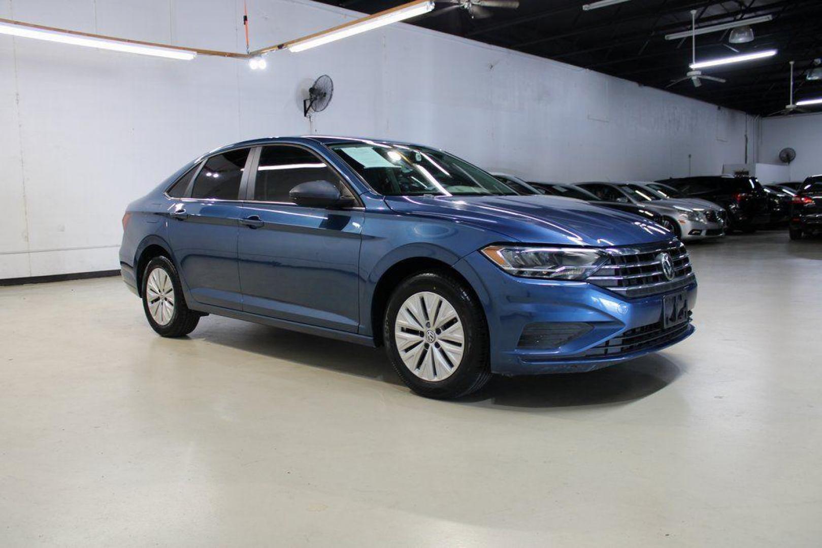 2020 Silk /Black Volkswagen Jetta 1.4T S (3VWCB7BU6LM) with an 1.4L TSI engine, Automatic transmission, located at 15300 Midway Rd., Addison, TX, 75001, (972) 702-0011, 32.958321, -96.838074 - HOME OF THE NO HAGGLE PRICE - WHOLESALE PRICES TO THE PUBLIC!! Priced below KBB Fair Purchase Price!<br><br>Blue Silk Metallic 2020 Volkswagen Jetta 1.4T S<br><br>30/40 City/Highway MPG<br><br>Awards:<br> * 2020 KBB.com 10 Coolest New Cars Under $20,000<br><br>At Midway Auto Group, we strive to pro - Photo#6