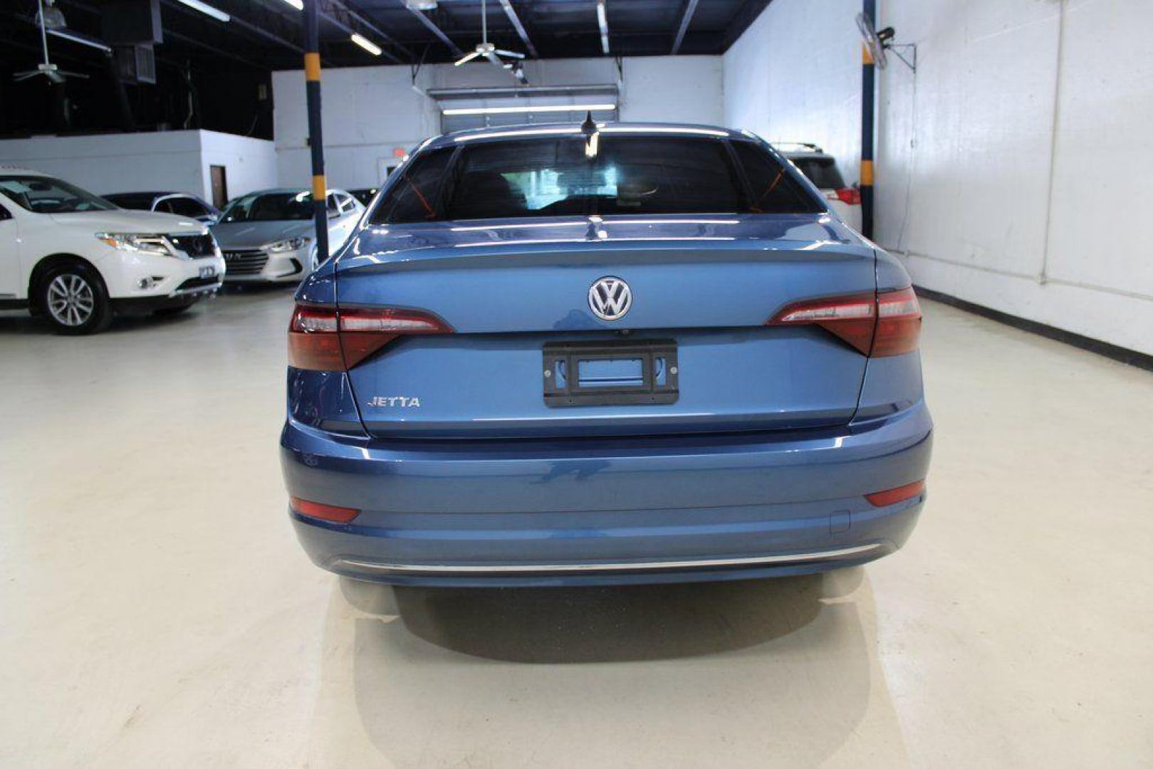 2020 Silk /Black Volkswagen Jetta 1.4T S (3VWCB7BU6LM) with an 1.4L TSI engine, Automatic transmission, located at 15300 Midway Rd., Addison, TX, 75001, (972) 702-0011, 32.958321, -96.838074 - HOME OF THE NO HAGGLE PRICE - WHOLESALE PRICES TO THE PUBLIC!! Priced below KBB Fair Purchase Price!<br><br>Blue Silk Metallic 2020 Volkswagen Jetta 1.4T S<br><br>30/40 City/Highway MPG<br><br>Awards:<br> * 2020 KBB.com 10 Coolest New Cars Under $20,000<br><br>At Midway Auto Group, we strive to pro - Photo#7