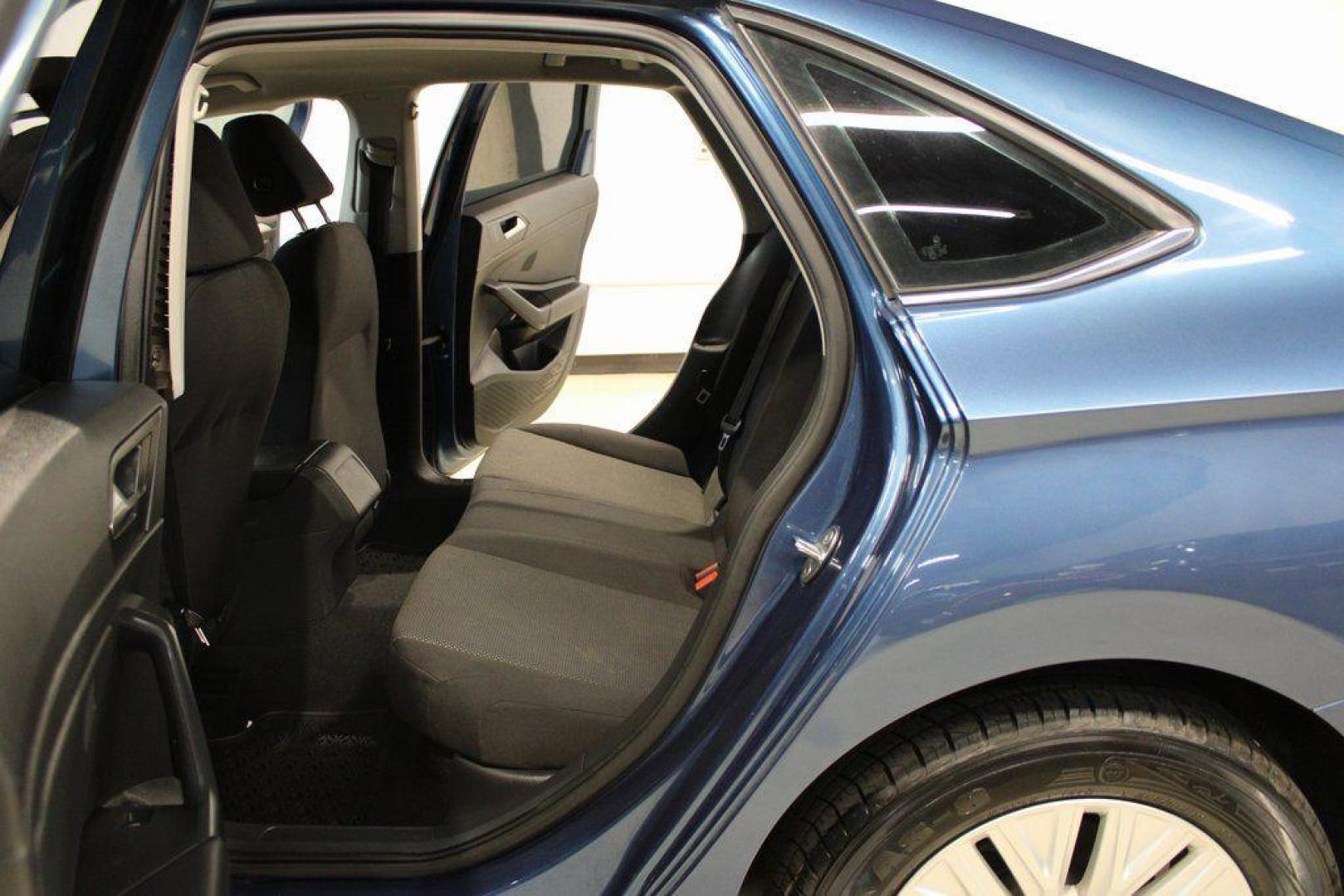 2020 Silk /Black Volkswagen Jetta 1.4T S (3VWCB7BU6LM) with an 1.4L TSI engine, Automatic transmission, located at 15300 Midway Rd., Addison, TX, 75001, (972) 702-0011, 32.958321, -96.838074 - HOME OF THE NO HAGGLE PRICE - WHOLESALE PRICES TO THE PUBLIC!! Priced below KBB Fair Purchase Price!<br><br>Blue Silk Metallic 2020 Volkswagen Jetta 1.4T S<br><br>30/40 City/Highway MPG<br><br>Awards:<br> * 2020 KBB.com 10 Coolest New Cars Under $20,000<br><br>At Midway Auto Group, we strive to pro - Photo#15