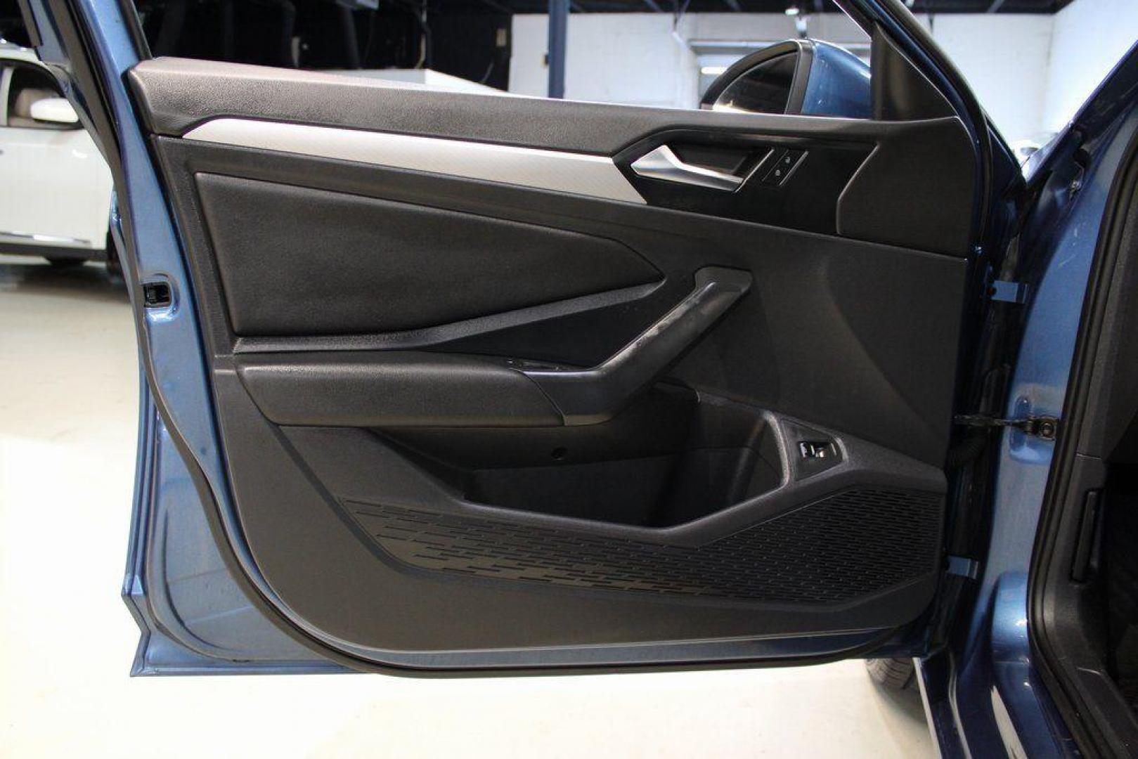 2020 Silk /Black Volkswagen Jetta 1.4T S (3VWCB7BU6LM) with an 1.4L TSI engine, Automatic transmission, located at 15300 Midway Rd., Addison, TX, 75001, (972) 702-0011, 32.958321, -96.838074 - HOME OF THE NO HAGGLE PRICE - WHOLESALE PRICES TO THE PUBLIC!! Priced below KBB Fair Purchase Price!<br><br>Blue Silk Metallic 2020 Volkswagen Jetta 1.4T S<br><br>30/40 City/Highway MPG<br><br>Awards:<br> * 2020 KBB.com 10 Coolest New Cars Under $20,000<br><br>At Midway Auto Group, we strive to pro - Photo#23