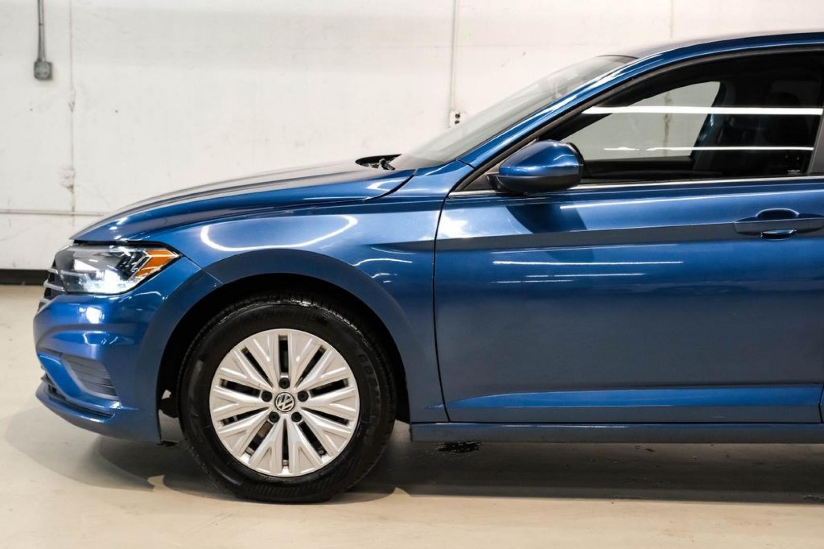 2020 Silk /Black Volkswagen Jetta 1.4T S (3VWCB7BU6LM) with an 1.4L TSI engine, Automatic transmission, located at 15300 Midway Rd., Addison, TX, 75001, (972) 702-0011, 32.958321, -96.838074 - HOME OF THE NO HAGGLE PRICE - WHOLESALE PRICES TO THE PUBLIC!! Priced below KBB Fair Purchase Price!<br><br>Blue Silk Metallic 2020 Volkswagen Jetta 1.4T S<br><br>30/40 City/Highway MPG<br><br>Awards:<br> * 2020 KBB.com 10 Coolest New Cars Under $20,000<br><br>At Midway Auto Group, we strive to pro - Photo#11