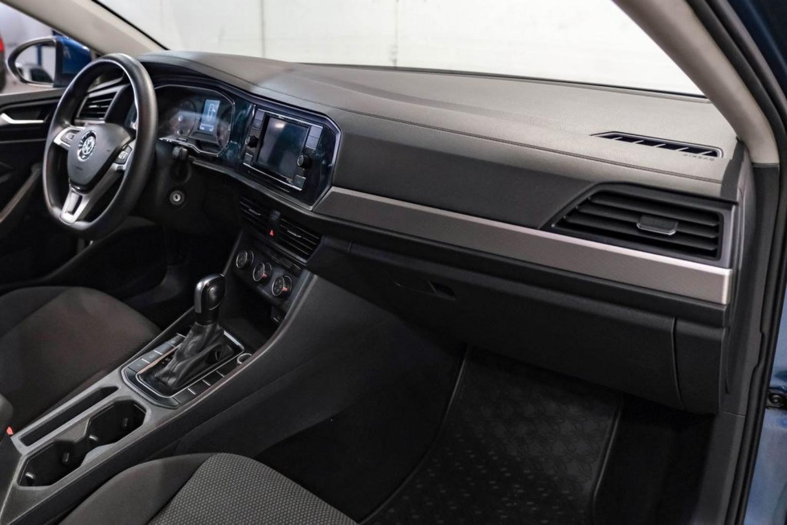 2020 Silk /Black Volkswagen Jetta 1.4T S (3VWCB7BU6LM) with an 1.4L TSI engine, Automatic transmission, located at 15300 Midway Rd., Addison, TX, 75001, (972) 702-0011, 32.958321, -96.838074 - HOME OF THE NO HAGGLE PRICE - WHOLESALE PRICES TO THE PUBLIC!! Priced below KBB Fair Purchase Price!<br><br>Blue Silk Metallic 2020 Volkswagen Jetta 1.4T S<br><br>30/40 City/Highway MPG<br><br>Awards:<br> * 2020 KBB.com 10 Coolest New Cars Under $20,000<br><br>At Midway Auto Group, we strive to pro - Photo#13