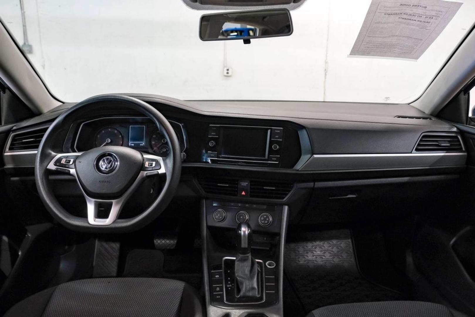 2020 Silk /Black Volkswagen Jetta 1.4T S (3VWCB7BU6LM) with an 1.4L TSI engine, Automatic transmission, located at 15300 Midway Rd., Addison, TX, 75001, (972) 702-0011, 32.958321, -96.838074 - HOME OF THE NO HAGGLE PRICE - WHOLESALE PRICES TO THE PUBLIC!! Priced below KBB Fair Purchase Price!<br><br>Blue Silk Metallic 2020 Volkswagen Jetta 1.4T S<br><br>30/40 City/Highway MPG<br><br>Awards:<br> * 2020 KBB.com 10 Coolest New Cars Under $20,000<br><br>At Midway Auto Group, we strive to pro - Photo#14