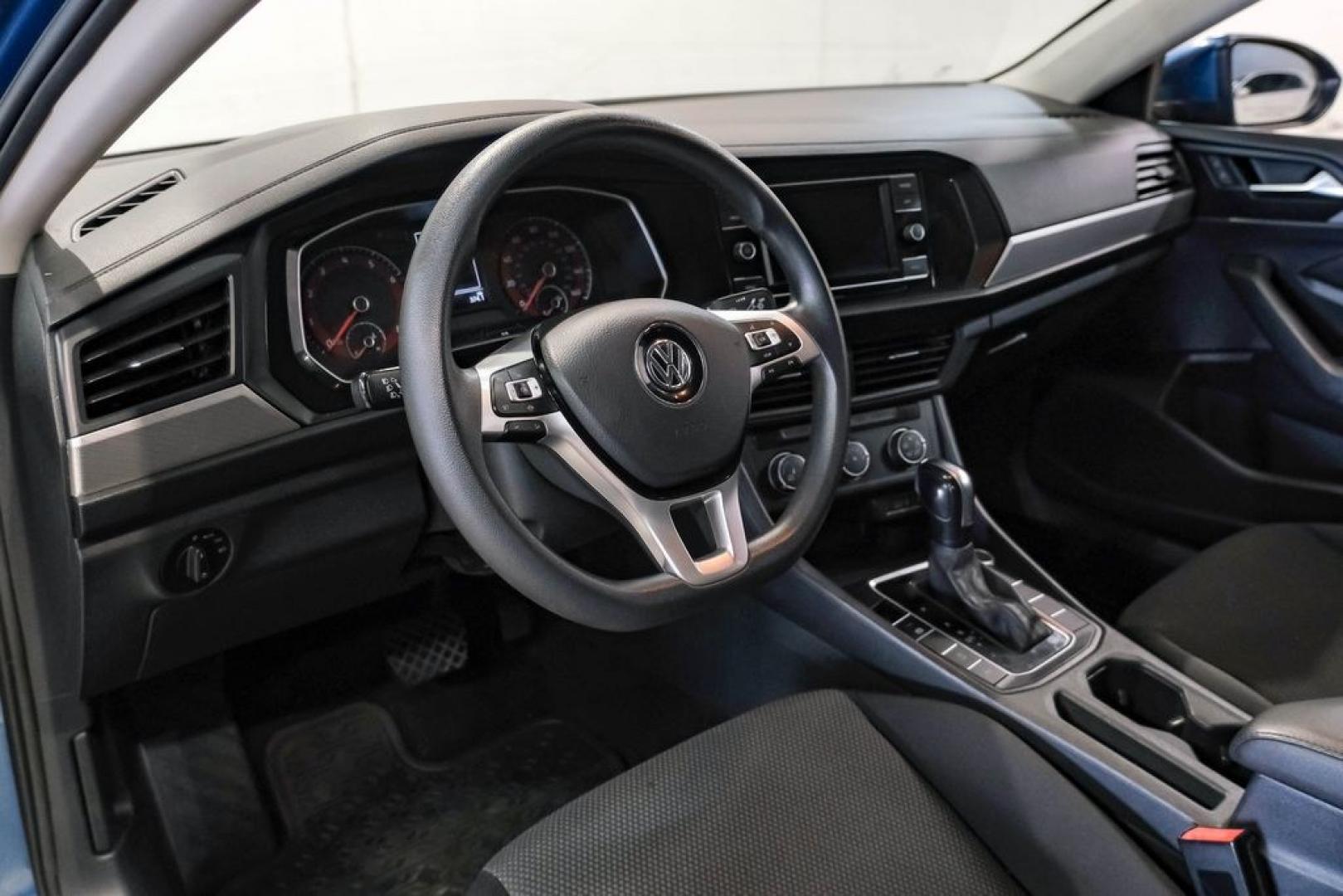 2020 Silk /Black Volkswagen Jetta 1.4T S (3VWCB7BU6LM) with an 1.4L TSI engine, Automatic transmission, located at 15300 Midway Rd., Addison, TX, 75001, (972) 702-0011, 32.958321, -96.838074- Photo#2