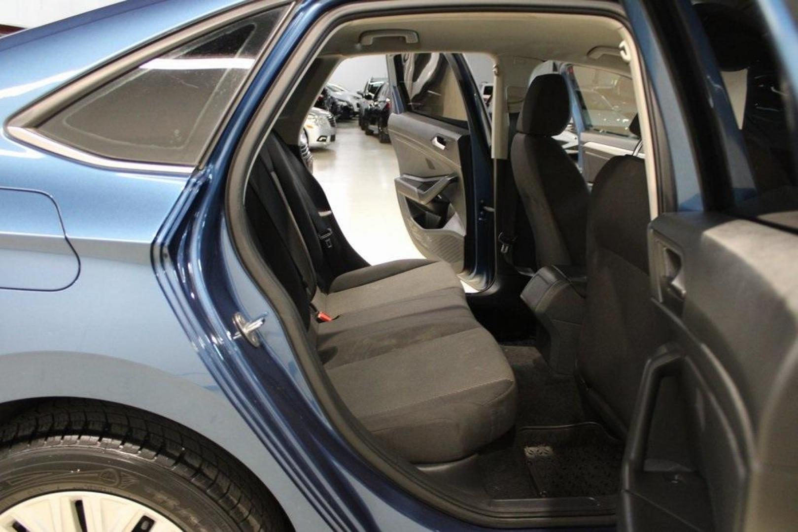 2020 Silk /Black Volkswagen Jetta 1.4T S (3VWCB7BU6LM) with an 1.4L TSI engine, Automatic transmission, located at 15300 Midway Rd., Addison, TX, 75001, (972) 702-0011, 32.958321, -96.838074 - HOME OF THE NO HAGGLE PRICE - WHOLESALE PRICES TO THE PUBLIC!! Priced below KBB Fair Purchase Price!<br><br>Blue Silk Metallic 2020 Volkswagen Jetta 1.4T S<br><br>30/40 City/Highway MPG<br><br>Awards:<br> * 2020 KBB.com 10 Coolest New Cars Under $20,000<br><br>At Midway Auto Group, we strive to pro - Photo#14