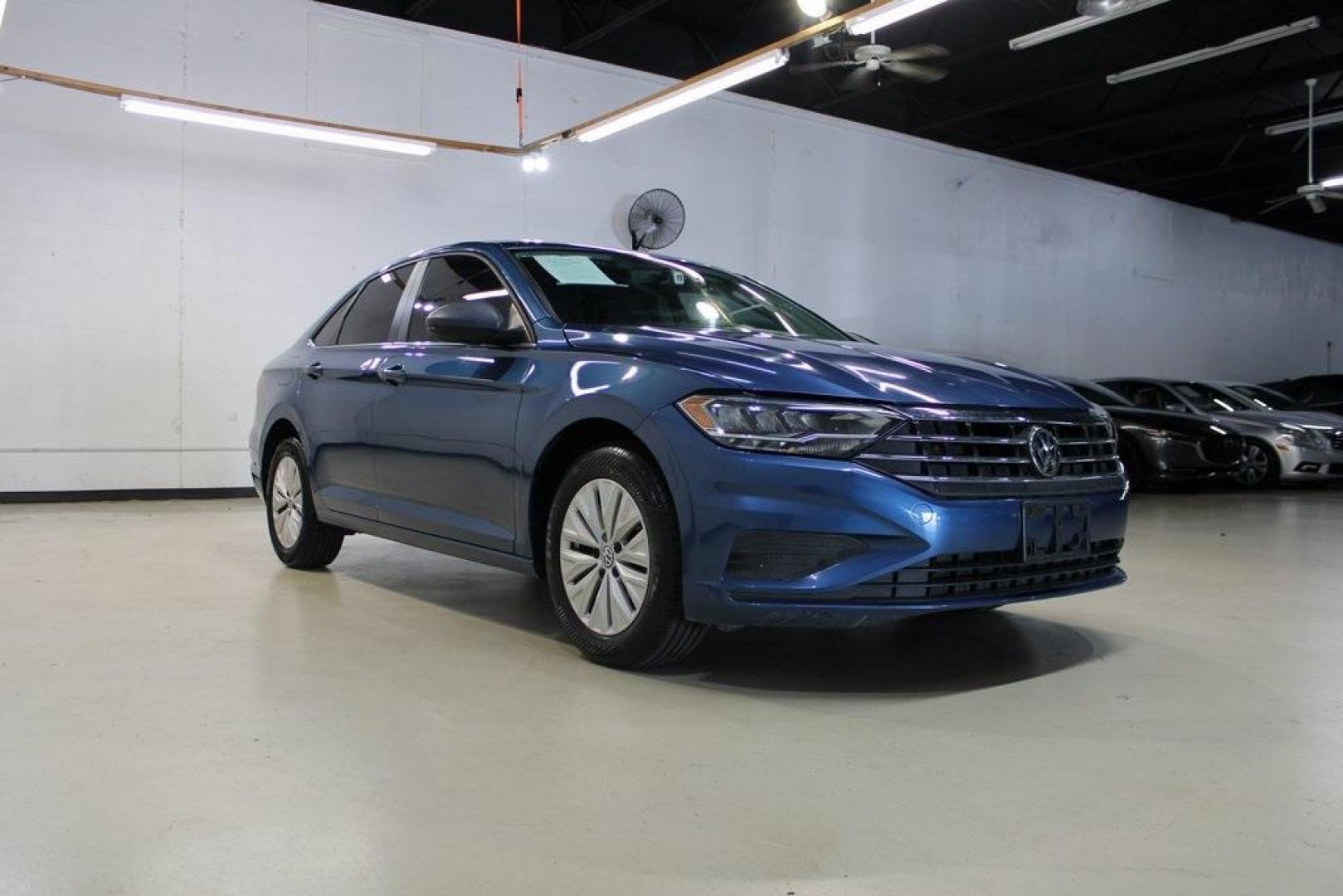 2020 Silk /Black Volkswagen Jetta 1.4T S (3VWCB7BU6LM) with an 1.4L TSI engine, Automatic transmission, located at 15300 Midway Rd., Addison, TX, 75001, (972) 702-0011, 32.958321, -96.838074 - HOME OF THE NO HAGGLE PRICE - WHOLESALE PRICES TO THE PUBLIC!! Priced below KBB Fair Purchase Price!<br><br>Blue Silk Metallic 2020 Volkswagen Jetta 1.4T S<br><br>30/40 City/Highway MPG<br><br>Awards:<br> * 2020 KBB.com 10 Coolest New Cars Under $20,000<br><br>At Midway Auto Group, we strive to pro - Photo#1