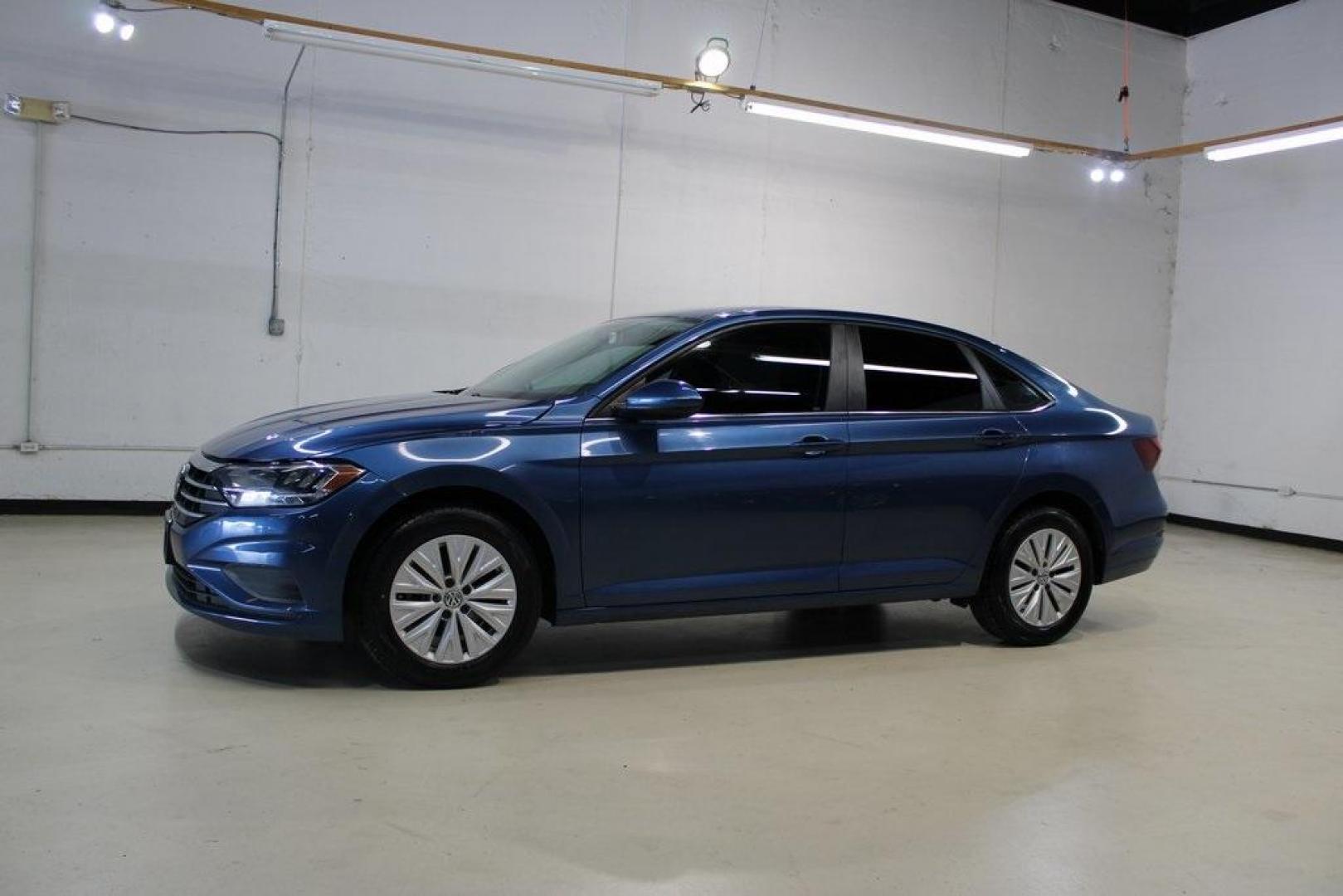 2020 Silk /Black Volkswagen Jetta 1.4T S (3VWCB7BU6LM) with an 1.4L TSI engine, Automatic transmission, located at 15300 Midway Rd., Addison, TX, 75001, (972) 702-0011, 32.958321, -96.838074 - HOME OF THE NO HAGGLE PRICE - WHOLESALE PRICES TO THE PUBLIC!! Priced below KBB Fair Purchase Price!<br><br>Blue Silk Metallic 2020 Volkswagen Jetta 1.4T S<br><br>30/40 City/Highway MPG<br><br>Awards:<br> * 2020 KBB.com 10 Coolest New Cars Under $20,000<br><br>At Midway Auto Group, we strive to pro - Photo#4