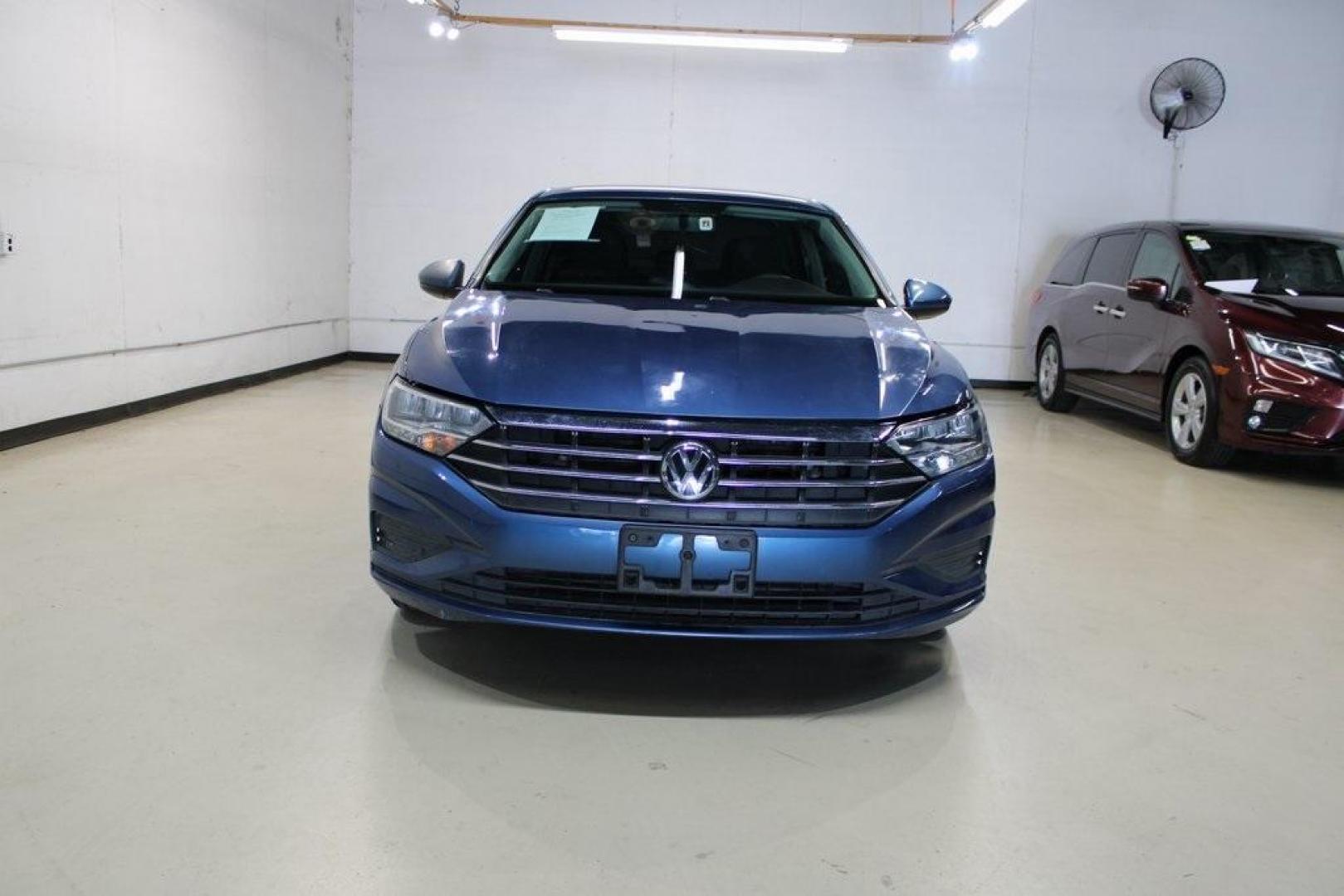 2020 Silk /Black Volkswagen Jetta 1.4T S (3VWCB7BU6LM) with an 1.4L TSI engine, Automatic transmission, located at 15300 Midway Rd., Addison, TX, 75001, (972) 702-0011, 32.958321, -96.838074 - HOME OF THE NO HAGGLE PRICE - WHOLESALE PRICES TO THE PUBLIC!! Priced below KBB Fair Purchase Price!<br><br>Blue Silk Metallic 2020 Volkswagen Jetta 1.4T S<br><br>30/40 City/Highway MPG<br><br>Awards:<br> * 2020 KBB.com 10 Coolest New Cars Under $20,000<br><br>At Midway Auto Group, we strive to pro - Photo#5